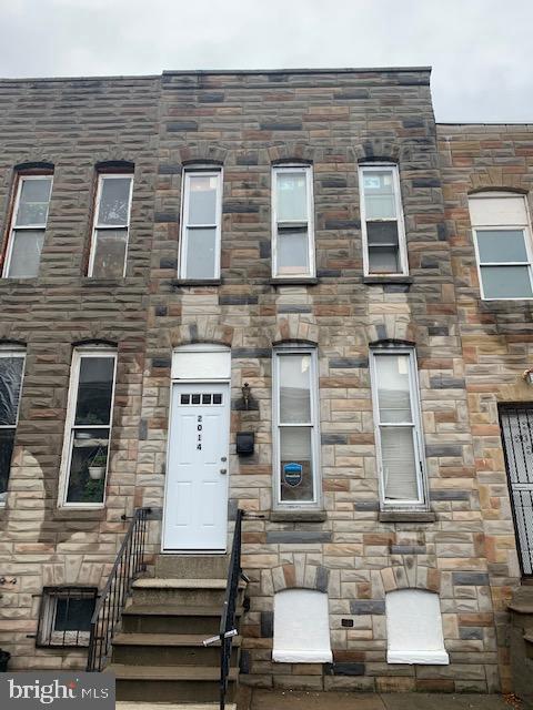 Nicely renovated 3BR 1BA home.  Large living room and dining room.  Big kitchen with plenty of cabinet space.  Exposed brick on first floor.  Cermaic tile bath.   1st. floor washer/dryer hook up.  Great rental home.  Rent includes water.  Close to transportation, shopping and dining.