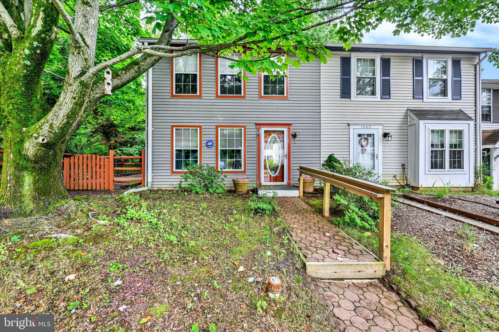 Rarely available end-unit townhome in sought-after Whispering Woods! Brand New 50 yr architectural roof! This move-in ready 3 bedroom, 1.5 bath home offers privacy and charm surrounded by mature trees. Enjoy spacious living areas, and a fenced rear yard perfect for relaxing or entertaining. Private shed provides additional storage. Conveniently located near shopping, restaurants, parks, and major commuter routes with easy access to Downtown Annapolis, Route 50, and I-97.