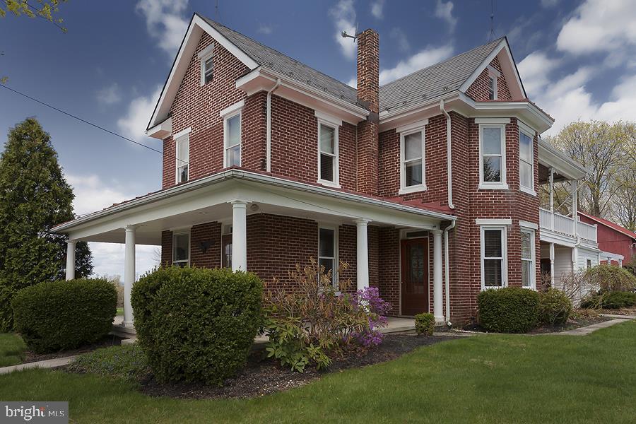 Beautifully restored 1920 farmhouse on 2.67 clear & level acres. Home features custom woodwork trim throughout, hardwd flrs, updated kitchen w/huge island & high end gas range. Master bedrm en suite w/double vessel vanity & Jacuzzi bath. Basement features a sauna rm & custom wine rack. Outdoor kit, 2nd flr covered deck w/hot tub, Florida rm & front covered patio.
