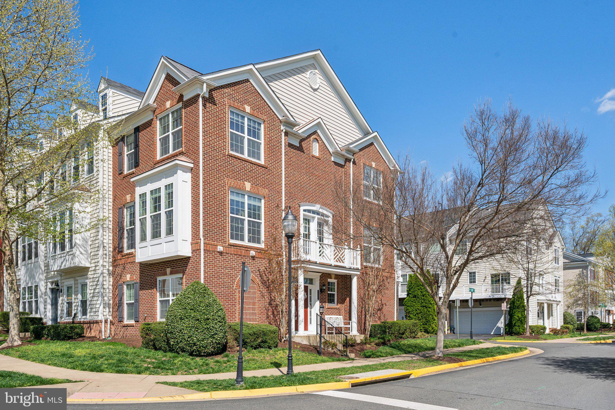 Welcome to the best views in Potomac Club! Gated community with amenities galore! Immaculate and well maintained Lancaster model end unit model with 2 car garage and driveway. Fantastic lot with great views from all sides of this home. So many windows and so much natural light! Gourmet kitchen with large table space. Gleaming wood floors. Work from home in the large ground level home office (or 4th bedroom) with a 1/2 bath. Spacious living room with formal dining area. Generous primary suite with ensuite bath that has both shower and soaking tub. Clubhouse with staffed gym & free classes, rock-climbing wall, indoor and outdoor pools, sauna, meeting room, basketball/multi-use courts, and party room with great community events. 3 Security gates with guards. Walk to Wegmans & Stonebridge Center with Alamo movie theater, Starbucks, Apple Store, great restaurants, and shops. Parking garage across the street with Metro bus. HOV 1/2 mile, VRE train 2 miles, EASY commute to DC, Ft. Belvoir, Quantico, and The Pentagon.
