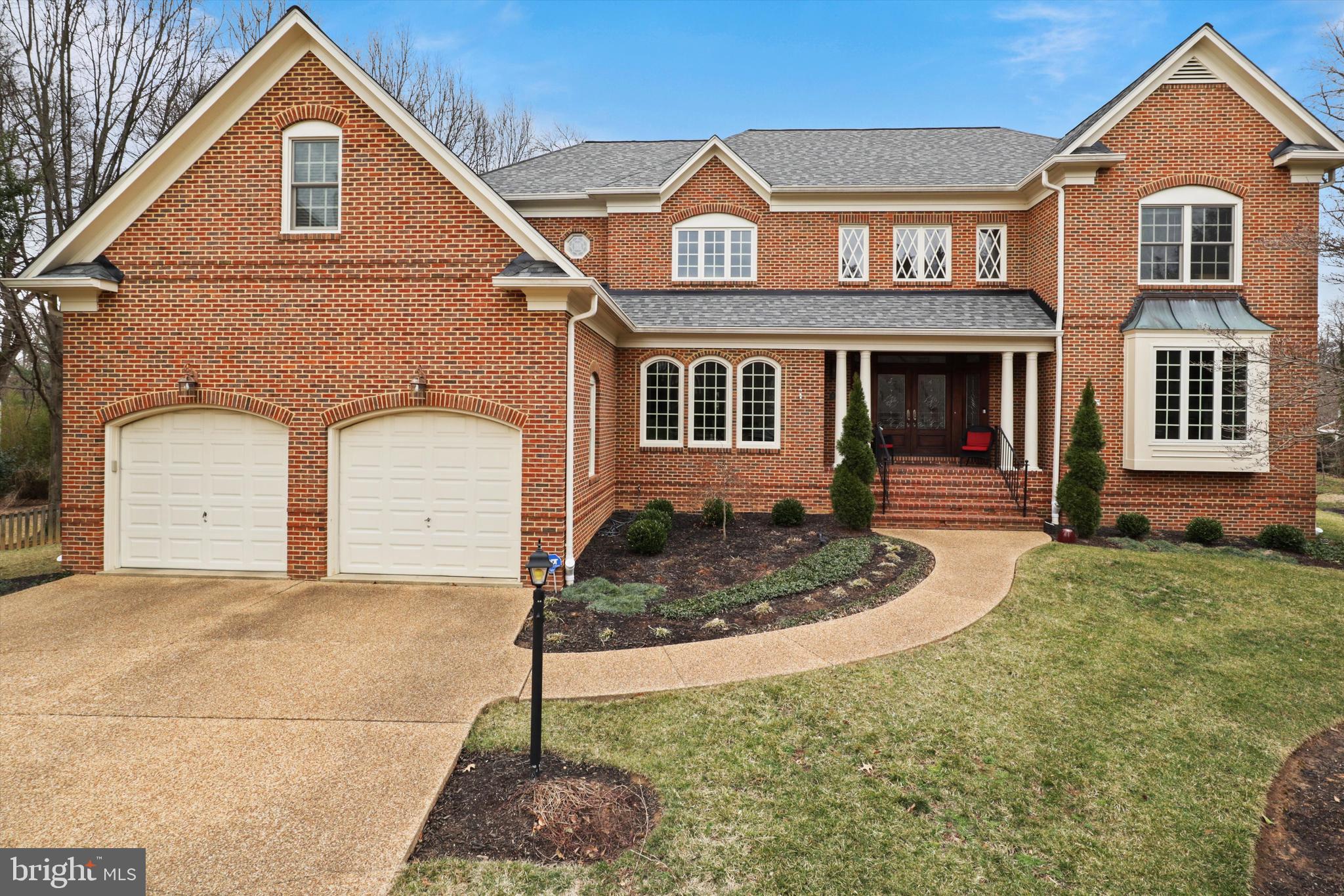 Luxury 6BR/4.55BA Home on 0.42 Acre Culdesac Lot in Mt Vernon! Stunning renovated kitchen w/ JennAir appliances, island/breakfast bar w/ gas cooktop, brushed gold fixtures, custom tile backsplash; opens to sunny breakfast room & great room w/ hi-ceiling & stone fireplace. Walkout to oversized composite deck overlooking backyard oasis thoughtfully designed by a local landscape architect for optimal color throughout the seasons. Peaceful primary suite retreat w/ huge walk-in closet w/ custom organizer system, cozy sitting area w/ gas fireplace, jetted tub. Daylight LL features rec room w/ fireplace, guest suite, media/exercise room, tons of extra storage, walkout access. Double entry doors w/ handmade leaded glass. Four sides of brick. Roof '21, Andersen windows '21, furnace (upper zone) '21, HWH '22. This home is steeped in history, situated on one of George Washington's original five farms. Just minutes to Ft Belvoir; scenic GW Parkway commute to Old Town & DC! Assumable 2.875% VA loan.