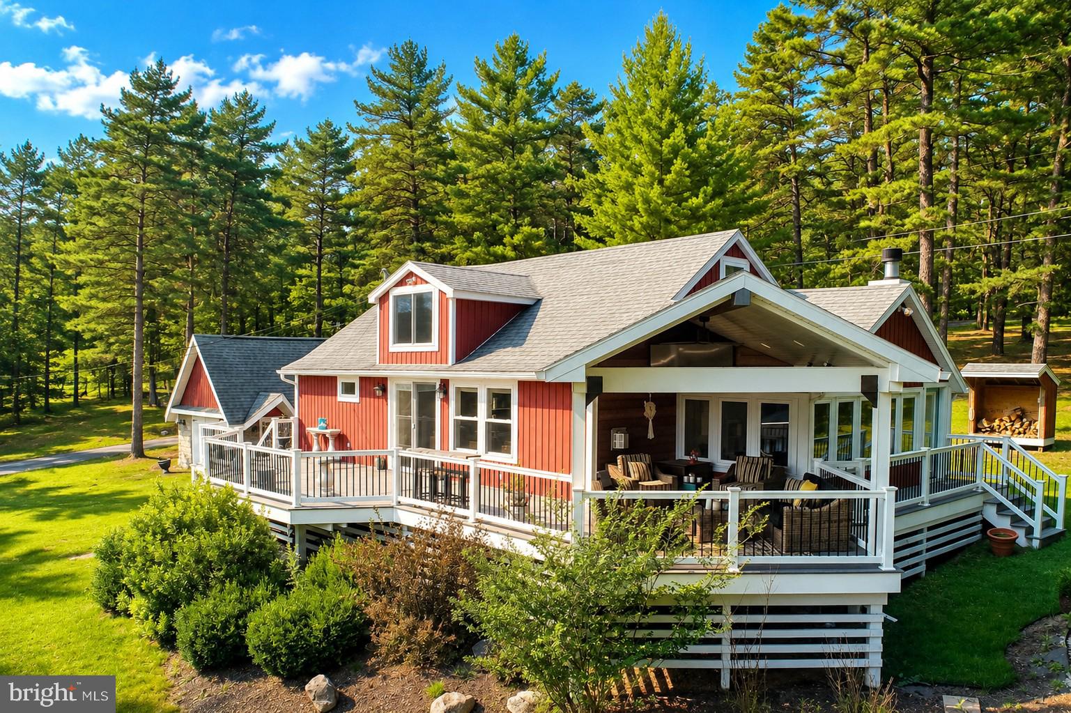 Cozy cottage with split lakefront and Type A dock located in the serene quiet Penn Point Cove.  This quaint home has plenty of room for family, guests and entertaining.  The covered & heated outdoor deck facing the lake is a great place for morning coffee and evening dinner.  The large, bright kitchen & dining area is another great entertaining space with quartz countertops, stainless steel appliances and plenty of room for large family gatherings. The home has 2 bedrooms on the main floor, a roomy living area with fireplace, full bathroom and a bonus sunroom with a wood burning fireplace. Upstairs has a great bunk room bedroom that can easily sleep 4 people, plus another living room and bathroom with a claw foot tub and shower.  Beautifully landscaped outdoor area has a firepit space, a detached garage with plenty of storage area and an easy walk to your dock area.  Great places to watch some of the best sunsets!  This home will convey turnkey furnished with a few seller exceptions. Schedule your tour today, this home has so much to offer.