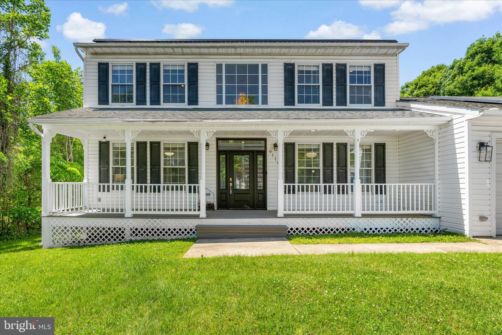 This gorgeous, completely remodeled 5-bedroom colonial is nestled among mature trees, creating a private indoor-outdoor retreat. Thoughtfully updated throughout, the home features fresh paint, hardwood flooring, recessed lighting, and beautifully renovated bathrooms and kitchen. The spacious main level offers an ideal layout with a separate family room, dining area, oversized home office, laundry room, and powder room. The updated kitchen boasts a large pantry and an additional refrigerator for extra storage and convenience. Just off the kitchen, step outside to a spacious deck overlooking the expansive backyard—perfect for relaxing, entertaining, or enjoying the peaceful surroundings.
Upstairs, you'll find 4 generously sized bedrooms, including the luxurious owner's suite featuring a spa-like en suite bath with a soaking tub and separate shower. 3 additional bedrooms and a full bathroom complete the upper level.
The finished walkout basement provides even more living space, complete with a wet bar, mini refrigerator, storage area, 5th bedroom, and full bathroom. With its extensive updates, flexible floor plan, and private setting, this exceptional home is ready for its next owner to move right in and enjoy!
Conveniently located just minutes from shopping, dining, and entertainment, including Maple Lawn, The Mall in Columbia, Merriweather District, and Historic Main Street Laurel. Easy access to I-95, Route 29, Route 32, and the ICC makes commuting to Baltimore, Washington, D.C., and surrounding areas a breeze.