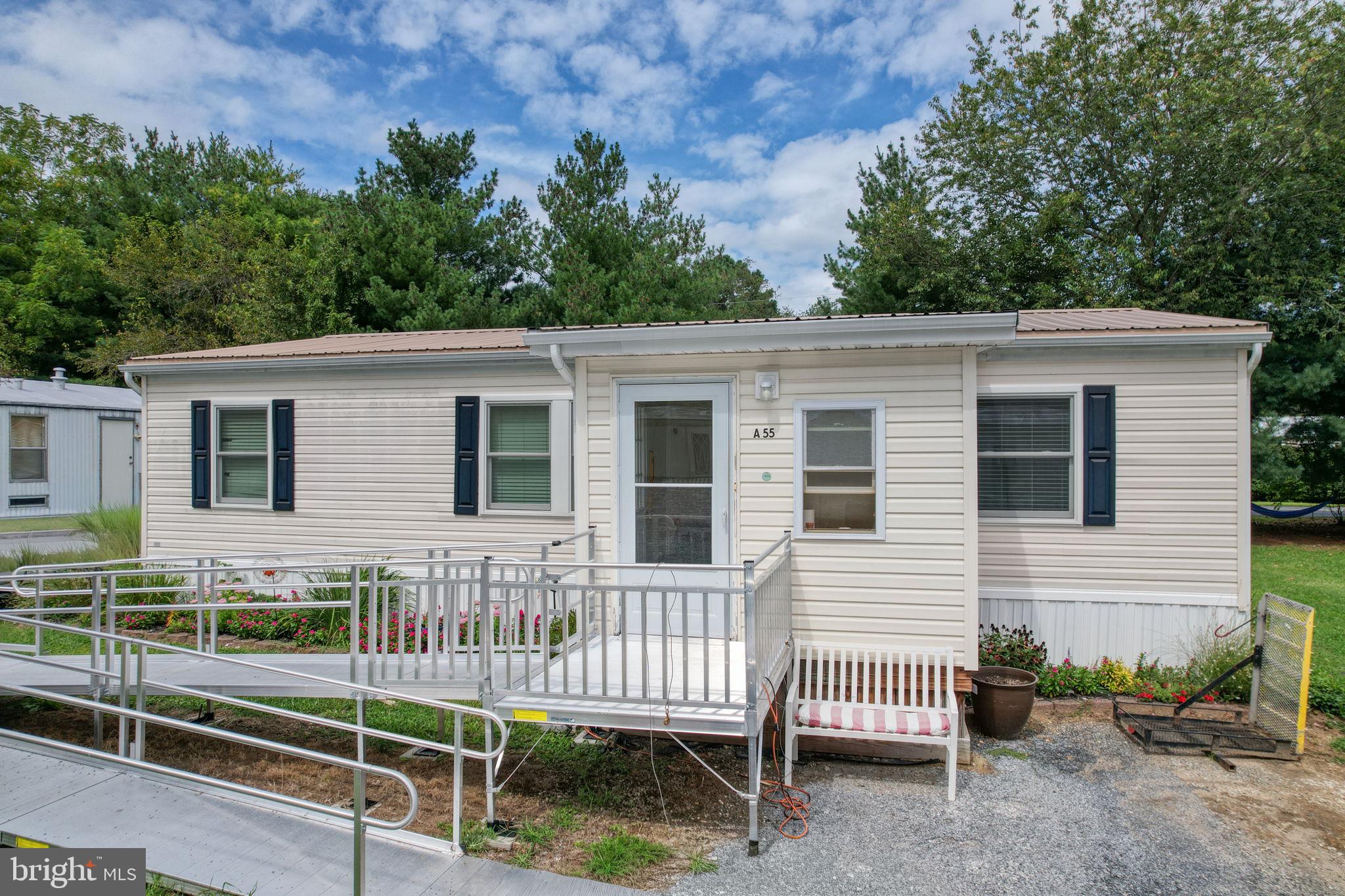 Well cared for 3-bedroom, 2-bath doublewide on a nice, landscaped lot. 2 additions provide extra living space as well. New Anderson Windows, New Flooring, Updated Bathrooms, New Roof, and much more. Don't let this one get away. Schedule your tour today. The sale has been approved by the park; the buyer must be approved. Current Lot Rent is $580, including discount