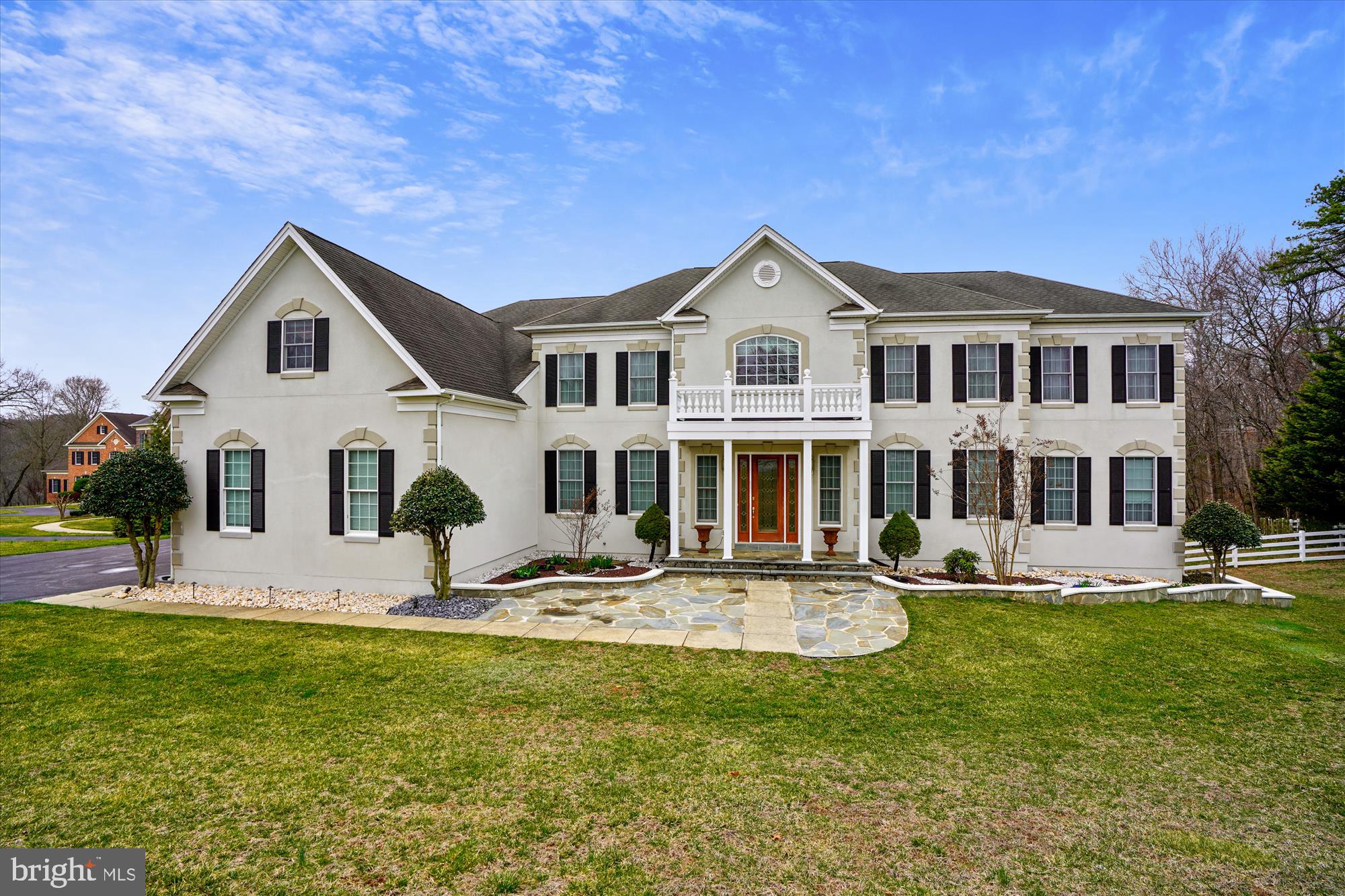 NOW AVAILABLE!  ABSOLUTELY STUNNING CUSTOM TOLL BROTHERS COLONIAL WITH ALL OF THE BUILDER OPTIONS.  NEARLY 10,000 SQUARE FEET OF FINISHED SPACE WITH 6 BEDROOMS AND 7 AND ½ BATHROOMS.  THE OWNERS SPARED NO EXPENSE WHEN HAVING THIS BUILT. BOTH THE MAIN AND UPPER LEVELS HAVE SPRAWLING HARDWOOD FLOORS AND ANDERSEN WINDOWS THROUGHOUT. STEP INSIDE THE 2-STORY, MARBLE-TILED GRAND ENTRANCE WITH THE STRIKING IMPERIAL STAIRCASE, AND YOU’LL NOTICE THE QUALITY OF THIS HOME. THE GREAT ROOM FEATURES A 2-STORY STONE FIREPLACE WITH WINDOWS ON THREE SIDES. THE ENORMOUS, GOURMET, ISLAND KITCHEN GOES ON FOREVER AND OPENS TO A SUN-DRENCHED BREAKFAST ROOM PERFECT FOR ENJOYING ANY MEAL. THE SUNROOM CAN BE ENJOYED AS-IS OR USED AS A MAIN LEVEL OWNER’S SUITE COMPLETE WITH A FULL BATHROOM AND WALK-IN CLOSET. THE MAIN LEVEL OFFICE IS ENORMOUS AND OFFERS A GREAT VIEW OF THE BACKYARD. UPSTAIRS IS ABSOLUTELY SPECTACULAR AND EACH OF THE 4 BEDROOMS HAVE THEIR OWN FULL BATHROOMS. THE OWNER’S SUITE IS ENORMOUS AT 32X13 WITH A 13X17 SPA-LIKE BATHROOM AND A 10X27 WALK-IN CLOSET. THE WALK-OUT BASEMENT HAS BEEN FULLY FINISHED WITH TILE FLOORS, RECESSED LIGHTING, A SPACIOUS BEDROOM, THEATRE ROOM, 2 FULL BATHS, AND A HUGE WET BAR COMPLETE WITH A WINE FRIDGE – IT’S AN ENTERTAINER’S DREAM SITUATED ON A PRIVATE .9 ACRE LOT IN SOUGHT-AFTER WOODBINE WHERE YOU CAN TAKE ADVANTAGE OF THE AWARD-WINNING HOWARD COUNTY SCHOOLS AND SO MUCH MORE.