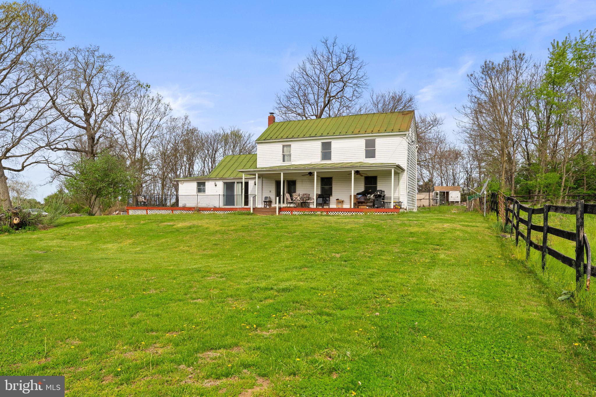 Charming 1902 farmhouse situated on 15 scenic acres in Berryville. This home offers classic character with comfortable living space and abundant natural light. Enjoy peaceful country views from the welcoming front porch and spacious TRX front deck, perfect for relaxing or entertaining.

Equestrian ready property featuring a large 8 stall barn/stable, two run-in sheds, and a riding ring. Five hydraulic water pumps are conveniently located throughout the property to service pastures and livestock.

Additional farm features include a chicken coop with laying chickens that convey, providing fresh eggs and a true farm-to-table experience.

The barn is currently rented, generating approximately $11,000 annually, with potential for additional income. An excellent opportunity for horse enthusiasts or buyers seeking a property with income-producing potential.

Privately situated yet conveniently located just minutes from Route 7, offering easy access while maintaining a peaceful, rural setting.