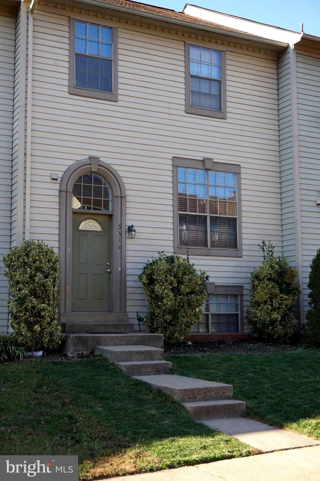 Well maintained 4-bed rooms townhouse located in a community with convenience - walking to shopping center, transportation, park and near highway.  Hardwood flooring throughout Living & Dining area. A deck off Kitchen, large eat-in area and breakfast bar. Lower level with walkout basement, stone fireplace, and fenced backyard. Plus one den with large windows can be a bedroom/studio.