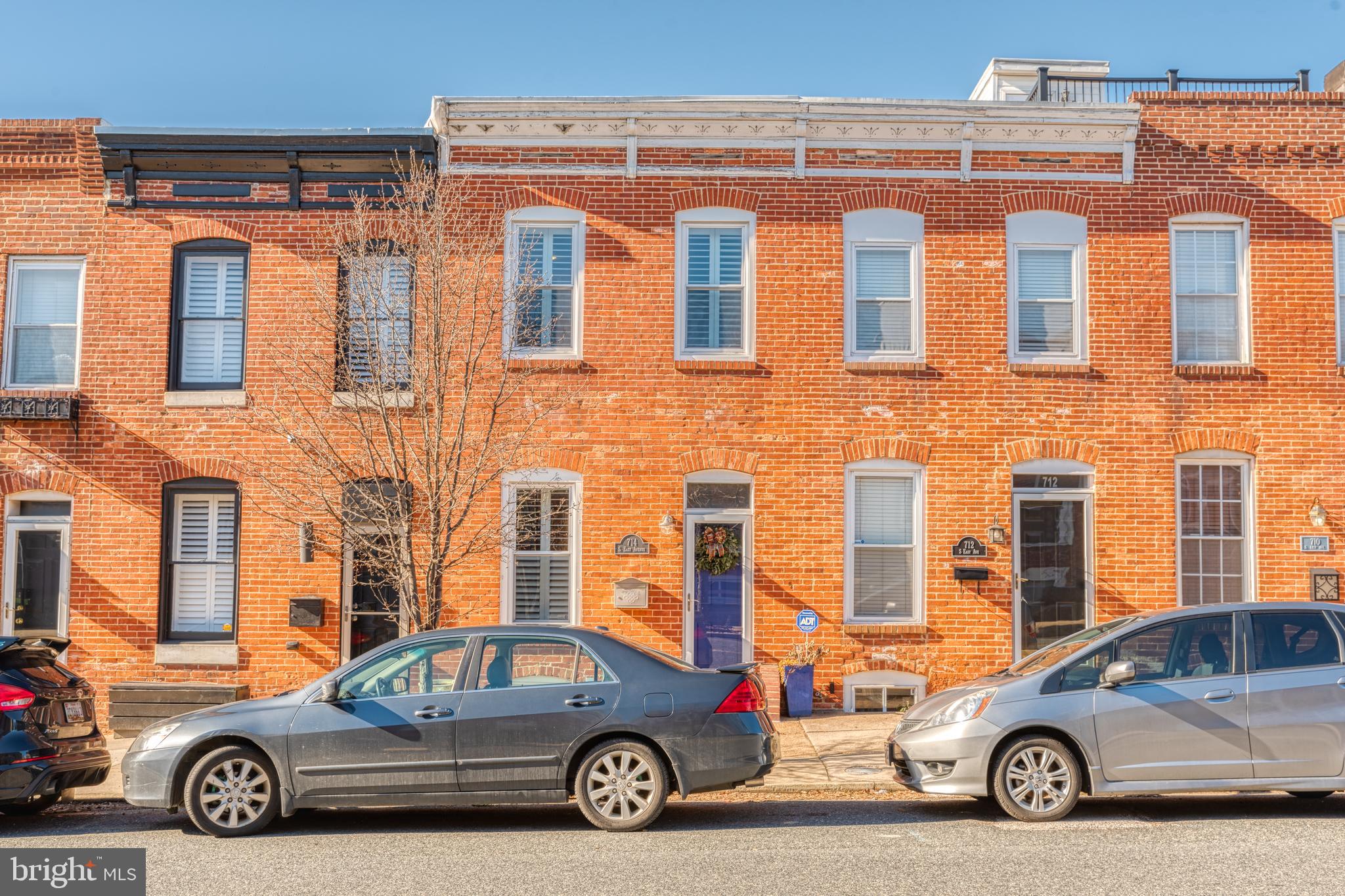 Welcome to 714 S East, situated in a PRIME location in one of Baltimore's most desirable neighborhoods, Canton. Just a short walk to Canton Waterfront Park, Patterson Park, Fells Point, and all the bars/restaurants Canton has to offer. On the main level, this home features an open floor plan with tons of room for entertaining. Hardwood floors, tons of natural light, ample dining area, and a recently renovated kitchen (2017) equipped with a built in bar area and beverage fridge. The full bath on the main level and oversized private back patio make this home perfect for entertaining.  Upper level comprises of not one but TWO master suites, each with spacious bedrooms, ample closet space/storage, and renovated bathrooms. Basement is mostly finished and perfect for a home gym, office, guest bedroom, or second living area. Turn key home, ready for you to move in! Roof done in 2018 with warranty that will convey to buyer, windows with plantation shutters replaced in 2017, and AC unit replaced in July 2020. Easy parking. Don't miss out on this fantastic value in a fantastic location!!! This home will sell in a flash!