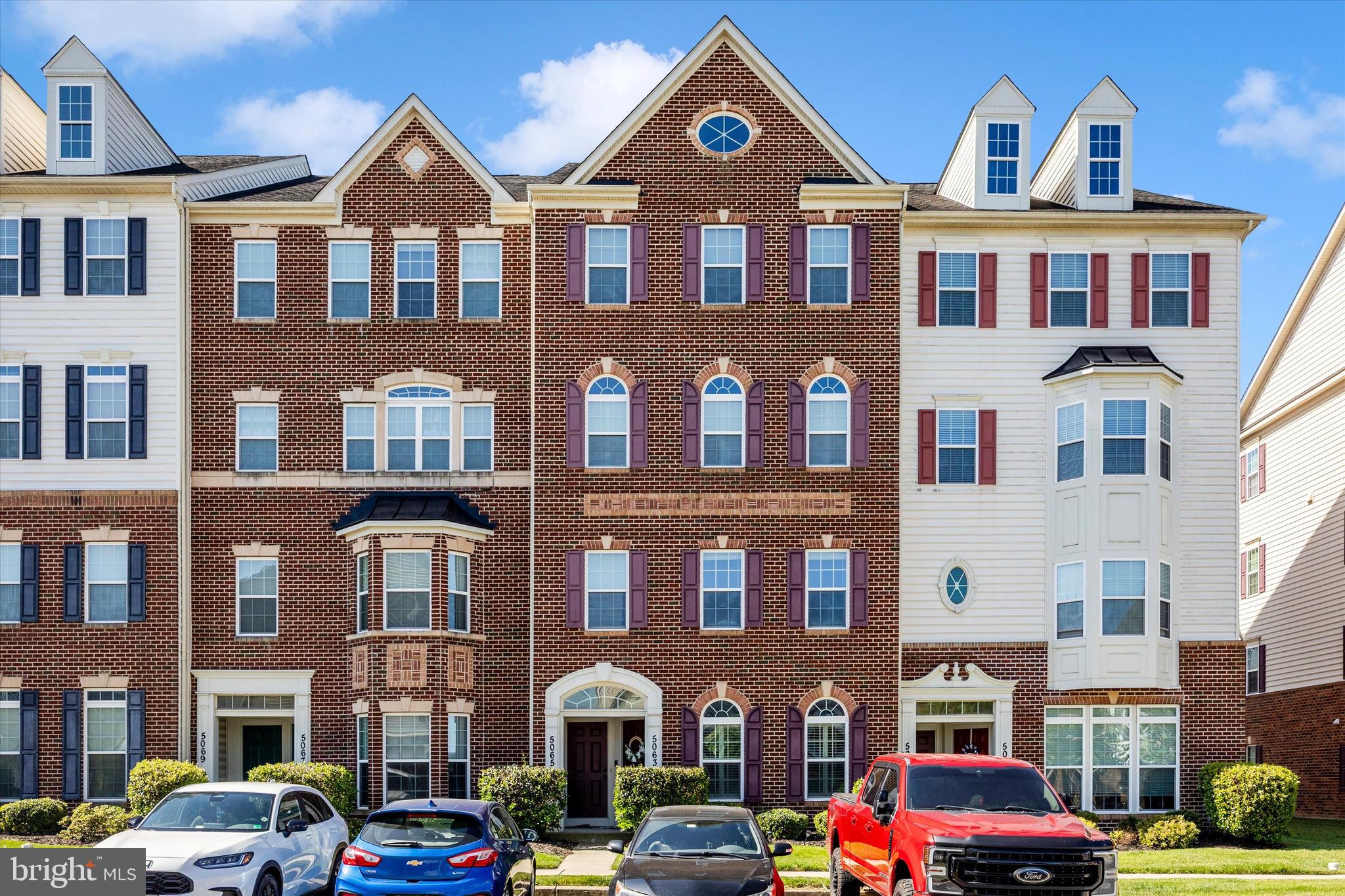 Move right into this beautifully maintained two-level, ground-floor condo/townhome in the highly desirable Ballenger Creek area. What truly sets this home apart from the others are four special upgrades not found in similar units. FIRST, the upgraded kitchen features attractive white painted cabinetry accented by rich hardware and granite countertops. SECOND, the main living/dining area showcases beautiful upgraded genuine hardwood flooring, adding warmth, elegance, and lasting value. THIRD, a gas wall heater in the living room provides supplemental warmth and comfort on chilly winter evenings. FOURTH, the conveniently located upper-level laundry area includes a newer oversized stackable washer and dryer with an estimated value of approximately $2,000. The open-concept main level is very comfortable. The main level has wo-piece crown molding and recessed lighting, Upstairs, the impressive 18' x 15' owner's suite offers two walk-in closets, and a private bath complete with a double-bowl vanity and dual shower heads. The two additional bedrooms measure 12' x 11' each and one has access to a private rear balcony.  Both levels feature approximately 9-foot ceilings, that creates a bright, open feel throughout the home. Best of all, there are NO CITY TAXES, while still being just minutes from shopping, dining, parks, and major commuter routes. Residents of Linton enjoy access to a large outdoor community pool, making this the perfect time to purchase and enjoy summer amenities. Exterior maintenance and lawn care are included, providing true low-maintenance living. The pride of ownership and meticulous care throughout this home are evident from the moment you step through the door.