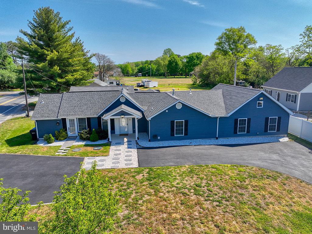 Welcome to 5404 Little Mastens Corner Rd in the heart of Felton—where modern updates meet flexible living space and peaceful surroundings.
This beautifully renovated 4-bedroom, 3-bath home has been thoughtfully updated from top to bottom, offering today��s buyers the finishes they want without the work they don’t. Step inside to find a stunning new kitchen featuring quartz countertops, stainless steel appliances, and durable luxury vinyl plank flooring that flows seamlessly throughout the home. Updated vinyl windows bring in natural light while enhancing energy efficiency and comfort.
Designed with versatility in mind, the home features a spacious primary suite privately situated on one side of the house, creating a true retreat. On the opposite wing, a second primary bedroom with its own full bath—along with two additional bedrooms and another full bathroom—offers the perfect setup for multi-generational living, guests, or a flexible work-from-home layout.
Outside, enjoy the quiet charm of country living while still being just minutes from everyday conveniences. Take a walk and grab a bite to eat at Felton Pizza or unwind at the Owl's Nest. Daily errands are a breeze being so close to Rt.13 and all it has to offer.  Do you enjoy the outdoors?  Killens Pond State Park offers everything for outdoor enthusiasts.  From a waterpark with slides, a leisure pool and a tot lot to enjoying time with the family on the water—whether on a kayak, pedal boat, or canoe—you can enjoy nature in all its glory.  Bring the kids and go camping either in a tent or your RV.  Go bass fishing or maybe try your luck catching crappie or sunfish from the boardwalk.  
If you're looking for a home that combines modern upgrades, flexible living arrangements, and small-town accessibility—this is it.
Back to active, no fault of Seller.