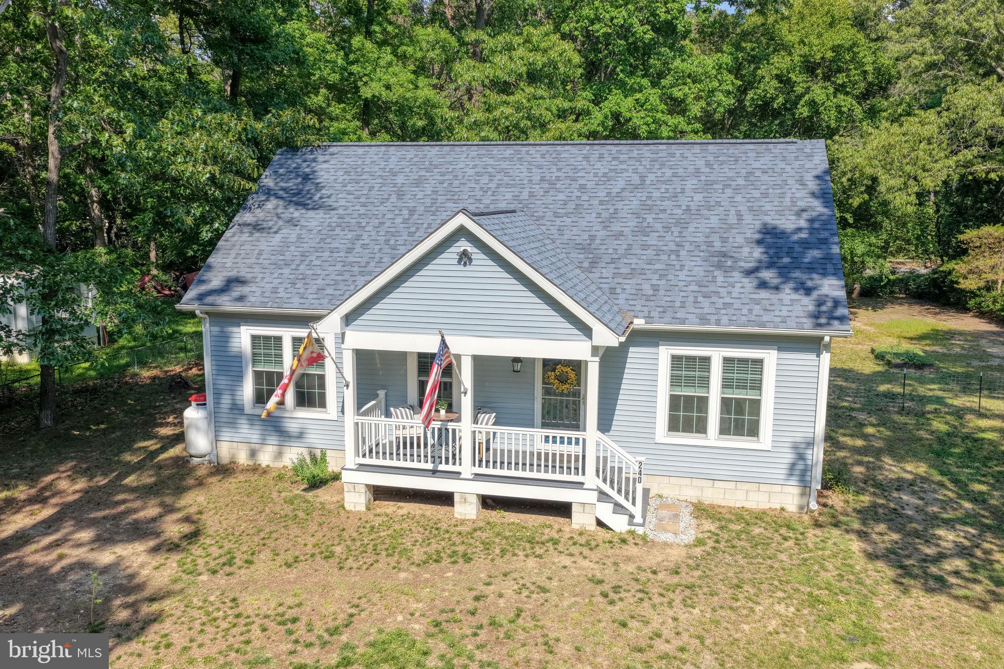 Practically brand new and just 2 years young, this beautifully maintained home is perfectly situated in a desirable water-oriented community—offering the best of Eastern Shore living! Located in the Queen Anne’s County school district and just minutes from downtown Chestertown, you’ll love the convenience paired with the peaceful setting.
Enjoy easy access to the Chester River—you can drive your boat to the community ramp at the end of the street, or even take a nice short walk down to the water, to spend your days crabbing, fishing, kayaking, or simply soaking in the waterfront lifestyle.
Inside, this 3-bedroom, 2 full bath home features durable and stylish LVP flooring throughout and a thoughtfully designed split floor plan. The spacious primary suite is privately situated on one side of the home and offers a walk-in shower, dual vanity, and a beautifully appointed bath. On the opposite side, you’ll find two additional bedrooms and a full bath with a tub/shower combo—ideal for guests or flexible living.
The kitchen and living room are centrally located, creating an inviting and functional space for everyday living and entertaining.
A standout bonus—an unfinished upstairs area of 544 additional SF, already in place and ready for your vision! Use it for storage now or finish it off for additional bedrooms, a home office, or recreation space.
Step outside and enjoy both a charming front porch—perfect for morning coffee—and a massive back deck ideal for entertaining, grilling, or simply relaxing while taking in the peaceful surroundings. The generously sized yard with mature trees offers both privacy and room to enjoy the outdoors.
Even more exciting—the county has indicated plans to pave the road in the near future.
Added perk: fiber optic Talkie Internet is already available at the property, making working from home or streaming a breeze.
Move-in ready, full of potential, and located in a charming waterfront community—this one checks all the boxes!