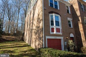 Spacious end-unit townhome walking distance to Metro and public transportion, Newly installed HVAC and loaded with upgrades!