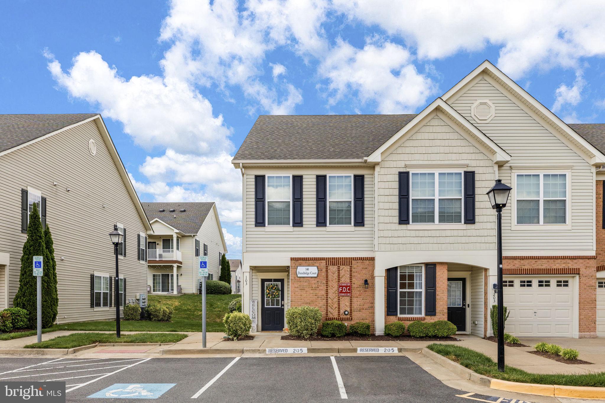 Gorgeously upgraded Colonial Forge Condo! Nothing left to do but move in! New hardwood flooring and carpet throughout the main living areas, 9+ foot ceilings, and abundant natural light. The open floorpan is great for entertaining and the kitchen does not disappoint. The elongated cabinetry has upgraded finishing and plenty of room for all your kitchen appliances and utensils. The kitchen also boasts stainless appliances and a large island with room for stools. The dining area has room for a large table and overlooks the nicely sized family room with patio access. Both bedrooms have carpeting, ceiling fans, and their own respective bathrooms. This condo also has an attached one car garage with a new garage door opener and driveway space. Walking distance to Colonial Forge High School and great community amenities to include the outdoor pool, tot lots, and dog park. Minutes to the new Embrey Mill Town Center and Jeff Rouse Swim and Sport Center. Lawn care and water/sewer are included in the condo fees!