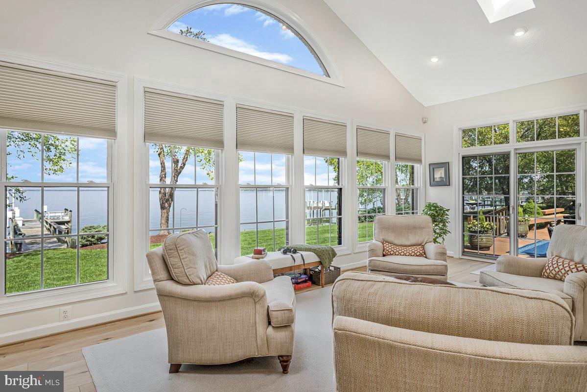 Price Improvement. Seller Has Adjusted the Price to Reflect Current Market Condition.  Now is your opportunity to Enjoy waterfront living in this all-brick custom home overlooking the Potomac River in the sought-after Swan Point Yacht & Country Club community!!! With over 3,300 square feet of single-level living space, this home offers beautiful sunset views and a relaxed waterfront lifestyle.
The home features a barrier-free layout with step-free entry and wide hallways for easy single-level living. Large windows fill the space with natural light and offer water views from many rooms. The open-concept living and dining areas are anchored by a gas fireplace, creating a comfortable and inviting space for everyday living and entertaining. The award-winning custom-designed kitchen will impress even the most discerning chefs and overlooks the sun-room—sure to become a favorite gathering spot in the home. The kitchen features high-end appliances, a wine refrigerator, and a walk-in pantry with custom cabinetry.
Outdoor living is a standout feature. The expansive deck and sun-room overlook the river and provide the perfect place to enjoy sunsets.  Property includes a private pier with boat lift and two jet-ski lifts offer direct access to the Potomac for boating and waterfront recreation.
The primary suite includes a fireplace and expansive views of the historic Potomac River. The ADA-inspired en-suite bath features a step-in shower, a separate step-in soaking tub, and a spacious layout designed for comfort and accessibility.
Residents of Swan Point Yacht & Country Club enjoy access to an 18-hole championship golf course, clubhouse pub and restaurant, marina, pool, tennis courts, pickle ball courts and walking trails. Located about 90 minutes from Washington, D.C., this home offers a peaceful waterfront setting with resort-style amenities.