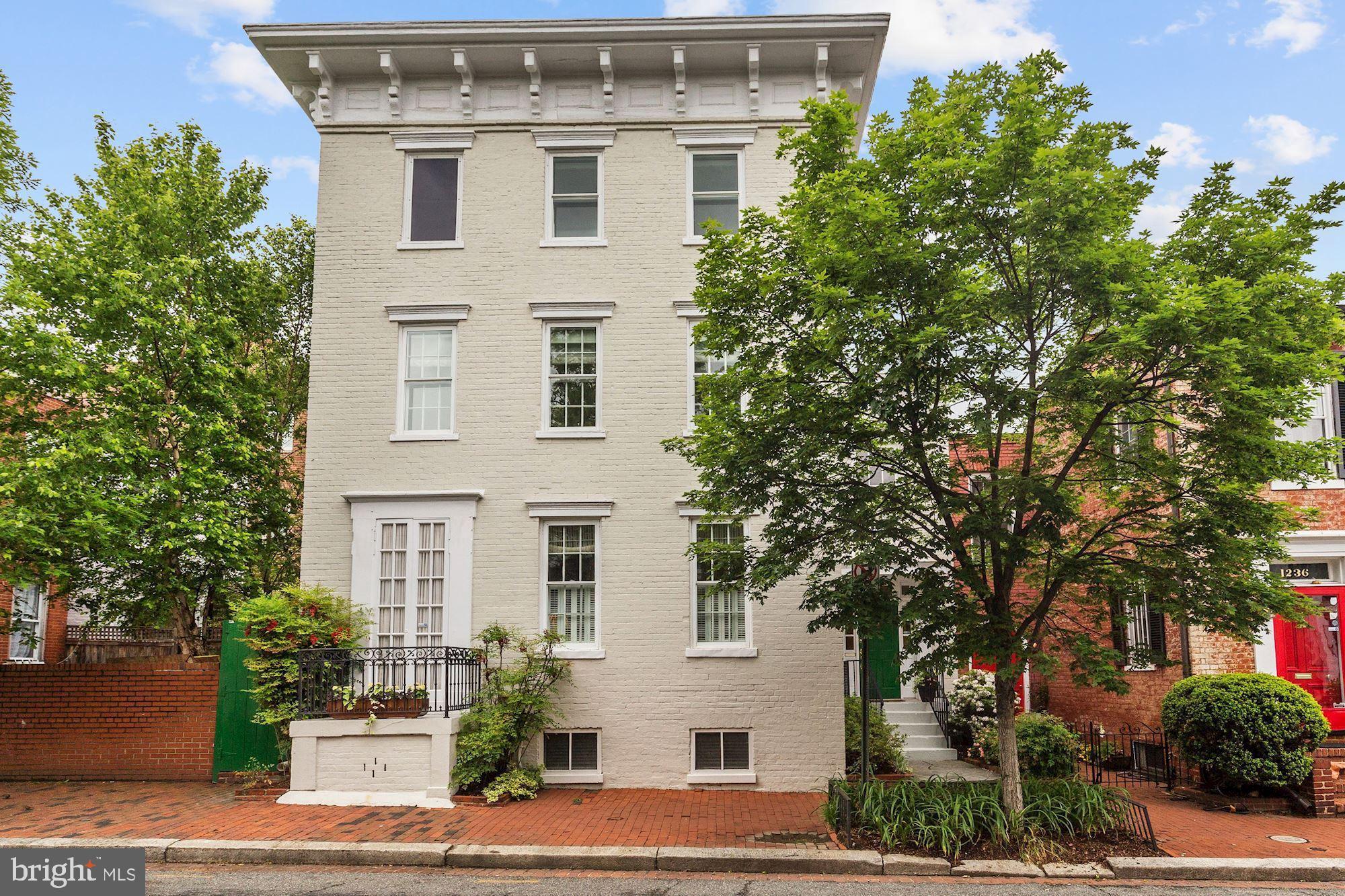 Large historic house in the West Village! The original part of this versatile house dates to 1790. The main level includes a spacious foyer,  living room with fire place and built-ins, dining room, gourmet kitchen that opens to the family room, a light-filled second informal dining room, and a second entrance used for a mud room and storage, as well as a powder room and laundry.  The second level Includes the master suite with a spectacular dressing room and bath. There is stunning room with high ceilings that makes a wonderful bedroom/library/playroom that walks out to the lush and landscaped private garden. There is another bedroom, bath and office/bedroom on this level. The top level is a bedroom and bath with views on three sides.  The lower level is a rec room, storage & cedar closet. There is 2-car rental parking in a garage just 30 feet from the front door.