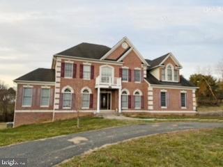 Don't miss this solid brick home with charm and magnificence in Ridgefield Farm. This home, which is located in a  scenic 1.89 acres lot on a quiet cul-de-sac, features  decorative arches and moldings, high ceiling , oversize windows, formal living room and dining room , stylish updated kitchen, spacious bedrooms and full baths.