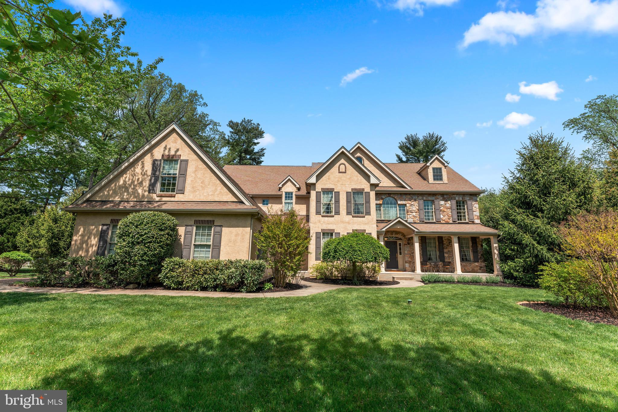 Nestled on a quiet cul-de-sac within the prestigious Preserve at Meadowbrook, this remarkable colonial estate is a showcase of refined craftsmanship and modern luxury. Designed with both elegance and functionality in mind, this stately home offers five expansive bedrooms, four full baths, and a thoughtfully placed powder room.

A dramatic arched entryway welcomes you into a sunlit foyer adorned with gleaming hardwood floors and intricate millwork, setting the stage for the exquisite details found throughout. The formal living room exudes classic charm with its crown molding and recessed lighting, while the adjoining dining room impresses with rich trim work and custom chair rail, perfect for hosting formal dinners.

At the heart of the home lies a stunning gourmet kitchen, featuring a professional-grade six-burner gas range, granite countertops, custom cabinetry with soft-close drawers and a decorative hood, and an oversized island crowned with stylish pendant lighting. A bright breakfast area opens seamlessly to a beautifully hardscaped EP Henry patio, ideal for indoor-outdoor living.

The great room invites comfort with a gas fireplace, custom built-ins, and a window bench for relaxed gatherings. A richly appointed bonus room with wood coffered ceilings, a wet bar, and direct access to the patio offers an exceptional space for entertaining.

Upstairs, the serene primary suite provides a true escape, complete with a tray ceiling, recessed lighting, dual walk-in closets, and a luxurious en-suite bath featuring dual vanities, a Jacuzzi soaking tub, and a private water closet. Four additional well-sized bedrooms include a Jack-and-Jill bath and a private en-suite, while the third floor offers a private fifth bedroom with its own sitting area and full bath, perfect for guests, in-laws, or an au pair.

Additional features include a full unfinished basement with egress and garage access, three-zone HVAC, robust steel I-beam construction, whole-house generator, underground irrigation system, and a spacious three-car garage.

A rare offering in one of the area’s most sought-after communities, this exceptional residence combines timeless architecture with the comforts of today’s finest living.
