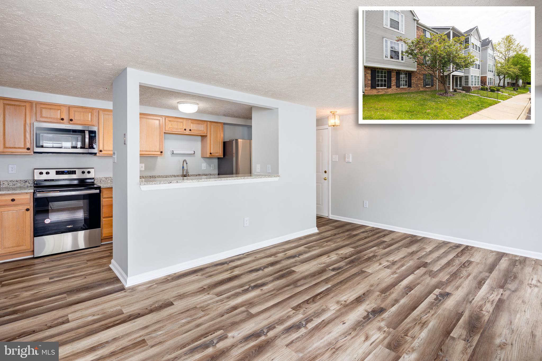 Carefree living in this move in ready first floor condo featuring 2 bedrooms and 1 full bathroom. This unit is easily accessible with a separate ground floor entrance so you never have to worry about stairs!  This unit also features all new paint and all new flooring throughout so you can move right in. Enter your private entrance into a window filled dining room with french doors leading to the patio. The kitchen has been recently remodeled with updated cabinetry, brand new granite and all new appliances.  Down the hall are two generously sized bedroom and an updated full bathroom. Convenient and close to shopping, restaurants and highways.  Condo is vacant and easy to show so schedule your showing today!