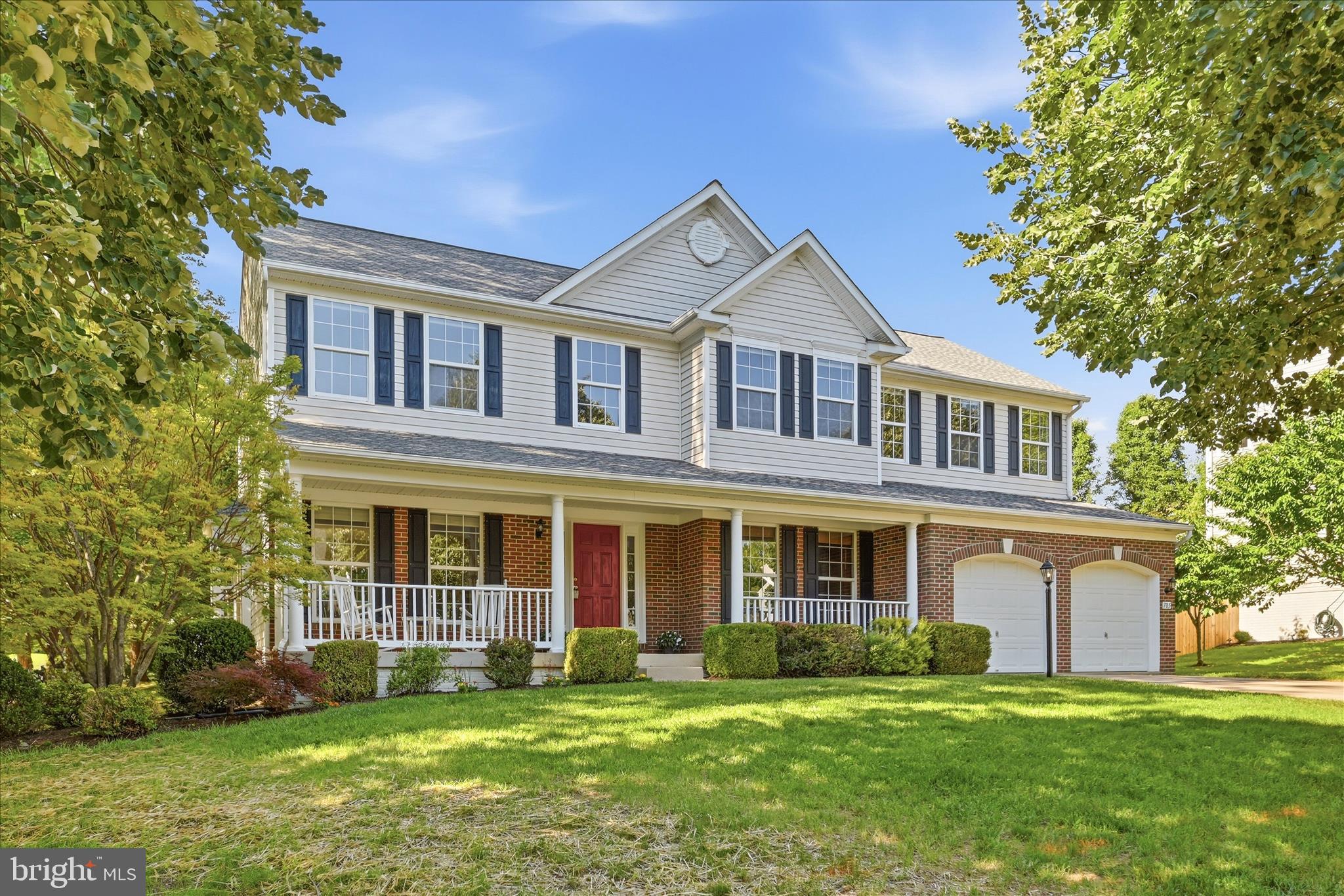 Stately Brick-Front Virginia II Model in Locust Grove – Your Turnkey Purcellville Retreat

Are you looking for a home that is move-in-ready, offering a private retreat from the stress and pressure of Northern Virginia life? Welcome to one of the largest and newest models in the highly sought-after Locust Grove community. Boasting a stately brick front and a welcoming front porch made for relaxing, this home combines immediate peace of mind with an unbeatable walkable lifestyle.

This property sits just a very short walk to Emerick Elementary School, the Loudoun Valley Community Center, and Fireman’s Field. Just a few more blocks gets you to the heart of Historic Main Street, where you can enjoy local favorites like Market Street Burger and Gruto’s soft-serve ice cream. 

The spacious, open floor plan of the coveted Virginia II model lends itself to making entertaining easy. The main level flows effortlessly, thanks to a grand family room upgraded with a six-foot extension and morning room surrounding the kitchen. Brand-new flooring stretches throughout almost every single room of the house. On the main level, you will find durable, gorgeous Luxury Vinyl Plank (LVP) paired with plush, neutral carpeting.

The upper level and basement feature brand-new upgraded carpet as well. Upstairs, you will find four comfortably sized bedrooms. The expansive Owner’s Suite serves as a true sanctuary, complete with an elegant vaulted ceiling, a dedicated sitting room, and two large walk-in closets. The upper-level hall bath has also been refreshed with new flooring and a double vanity. Need space for guests, a home office, or a multi-generational living situation? The fully finished basement features a large den, a full bathroom and a walk-out stairway, perfectly suited to adapt to your family's needs. As an added bonus, the attic features additional shelving and structural storage.

The backyard is your own private retreat… mature trees surround the deck and patio in natural privacy. It is the ultimate spot for evening relaxation, featuring a premium 6-person hot tub installed brand new in 2024. The three cherry trees and one apple tree on the side of the house are a bonus!

You can enjoy having peace of mind in this home since it has all the big-ticket maintenance items taken care of:
Main Furnace & Compressor: Brand New (Installed 2025)
Hot Water Heater: New (Installed 2021)
Sump Pump: New (Installed 2021)
Roof: New (Installed 2018)
Call your Realtor today to schedule your own private showing!