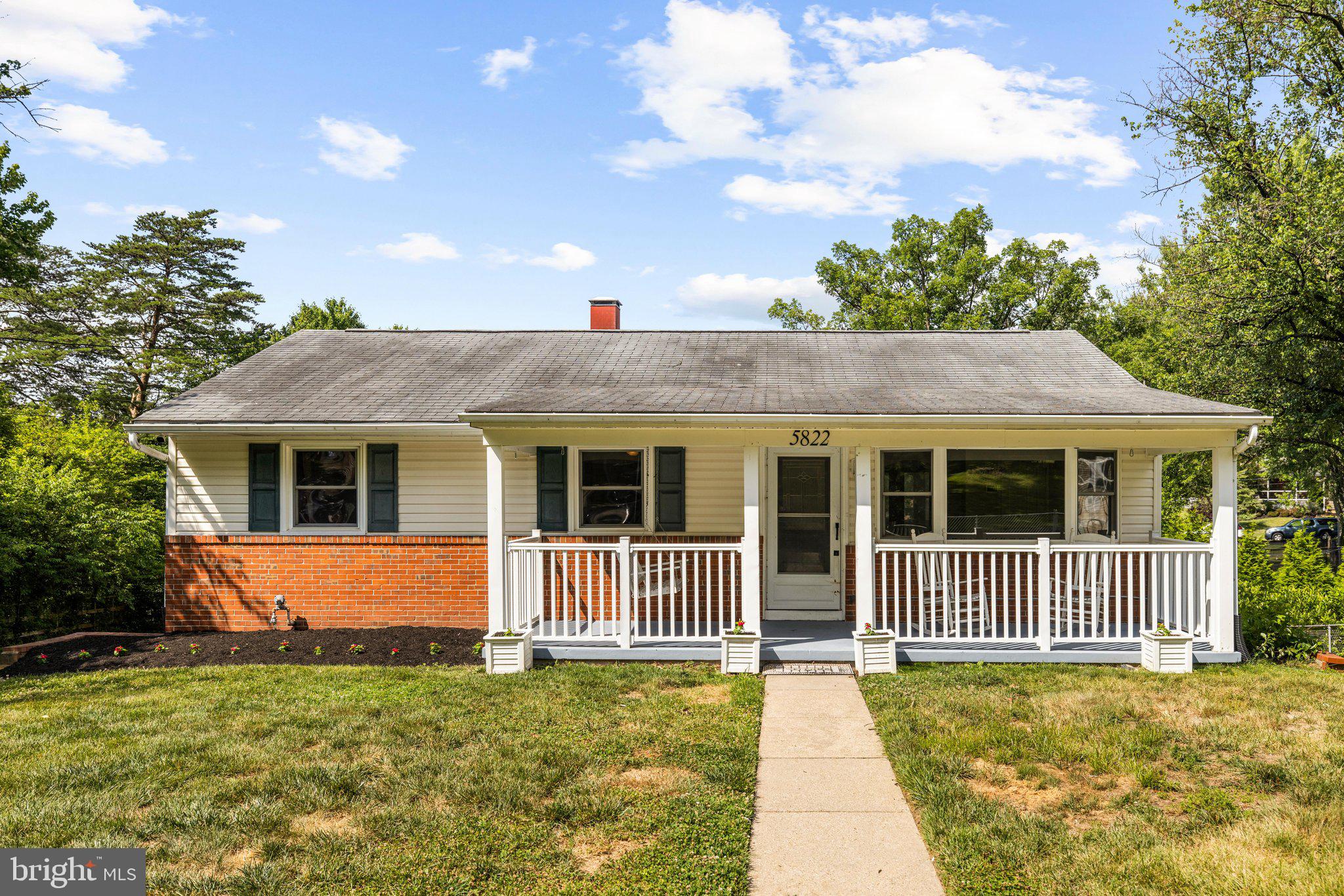 Welcome to 5822 Forest Hill Rd, a charming three-bedroom, one-and-a-half-bath ranch home offering comfortable living space, thoughtful updates, and a desirable walk-out basement. With more than 2,000 square feet including the sunroom and finished basement, this home combines everyday convenience with inviting indoor and outdoor spaces on a spacious .35-acre fenced yard. Inside, you’ll find fresh paint throughout the home, hardwood floors, and ceiling fans. The kitchen was updated in 2019 with modernized finishes, and the air conditioning system was also updated in 2019. The sunroom features new waterproof luxury vinyl flooring completed in 2026, adding another comfortable space to relax and enjoy the property. The recently remodeled lower level, completed in 2026, features fresh paint, new carpet, an updated half bath, and additional improvements. This flexible space includes a large recreation room and laundry/utility room, offering excellent potential for additional living, recreation, office, or workspace needs. A natural gas pot belly stove adds warmth and character, while the walk-out design provides convenient access to the yard. Enjoy outdoor living from the expansive deck, ideal for relaxing, grilling, and entertaining, along with the sunroom overlooking the fenced yard. The property also includes a two-car parking pad and two sheds, including one with electric that is well suited for workshop or storage. Conveniently located near parks, restaurants, and schools, this home offers easy access to Rockburn Park, Patapsco Valley State Park, the new Elkridge Volunteer Fire Department (just 0.9 miles away), and Elkridge Library (approximately 1.7 miles away). Major commuting routes, including I-95 and Route 100, are close by, with Fort Meade, NSA, and BWI Airport also within easy reach. The seller’s VA loan at 3.125% may be assumable. Plus, a home warranty is included for added peace of mind. No HOA. Welcome home!