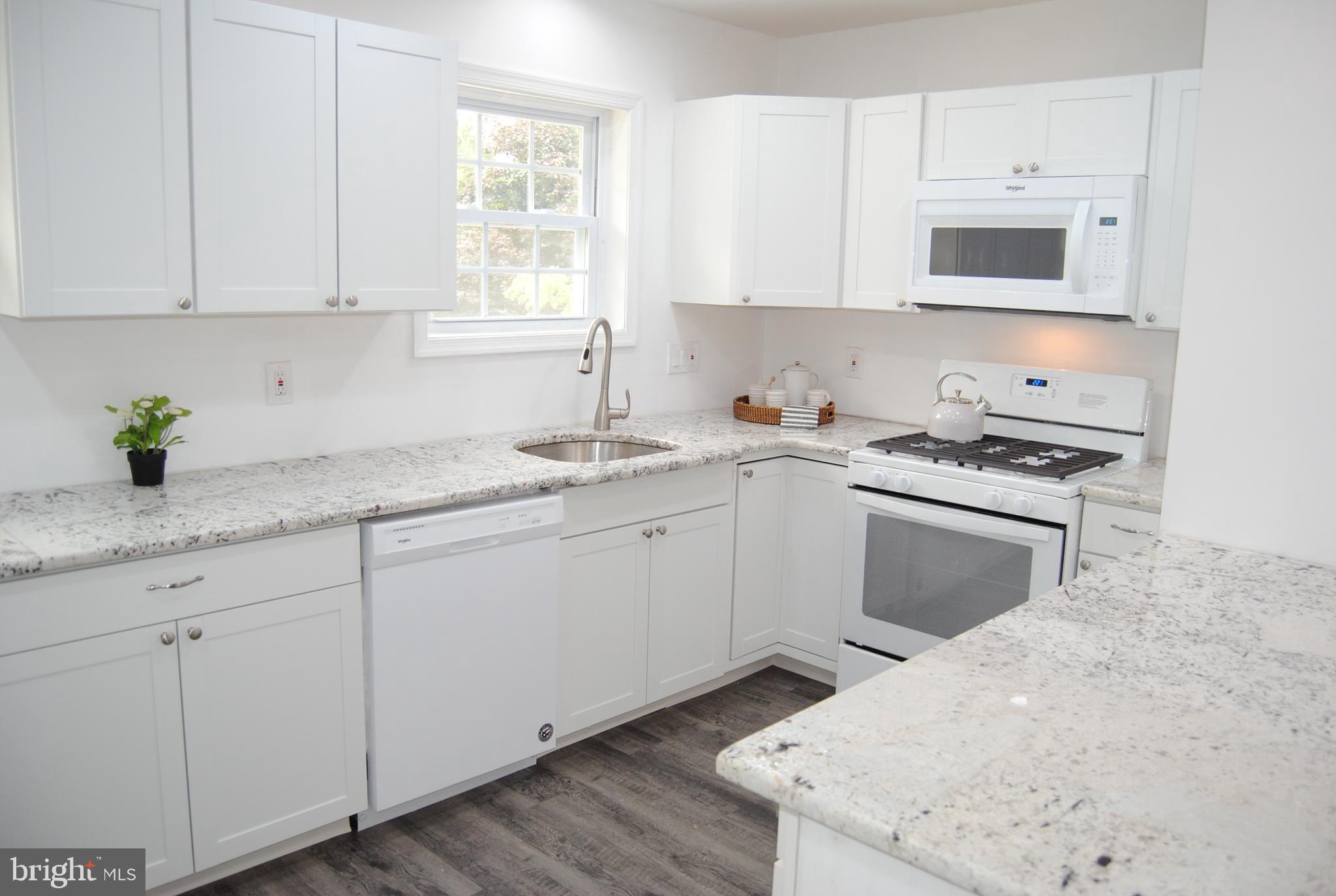 ** Highest and Best offer by 7/22/2021 8:00pm.** Gorgeous New remodel 3 bedroom 1 full bath and half bath in Norris Hills Norristown. Located on the border of Norristown and Plymouth Meeting. New Pergo tiled floor greets you as you enter the home via the living room and extends throughout, all the way to the kitchen. Open floor plan with gorgeous new kitchen. Hand selected decorative lighting and countertop to enhance cooking and dining experience. Brand new appliances. New half bath privately set off to the side of the living area leading to the finished basement. 
Ascend up the stairs on plush carpet to 3 large bedrooms and new beautiful full bathroom. All new windows. Then descend into the finished basement leading out to the brand new patio and huge back yard. Potential to use the basement as a 4th bedroom with 2 methods of egress. Walk into laundry/storage area with a new washer, new dryer. Mechanicals share the area. New HVAC, new hot water heater. New electrical, and New plumbing. Walkout from the laundry to the driveway and the garage. Enjoy the large backyard to create new memories with family and friends.  Close to Elmwood zoo,  King of Prussia Mall , PA turnpike  And so much more!