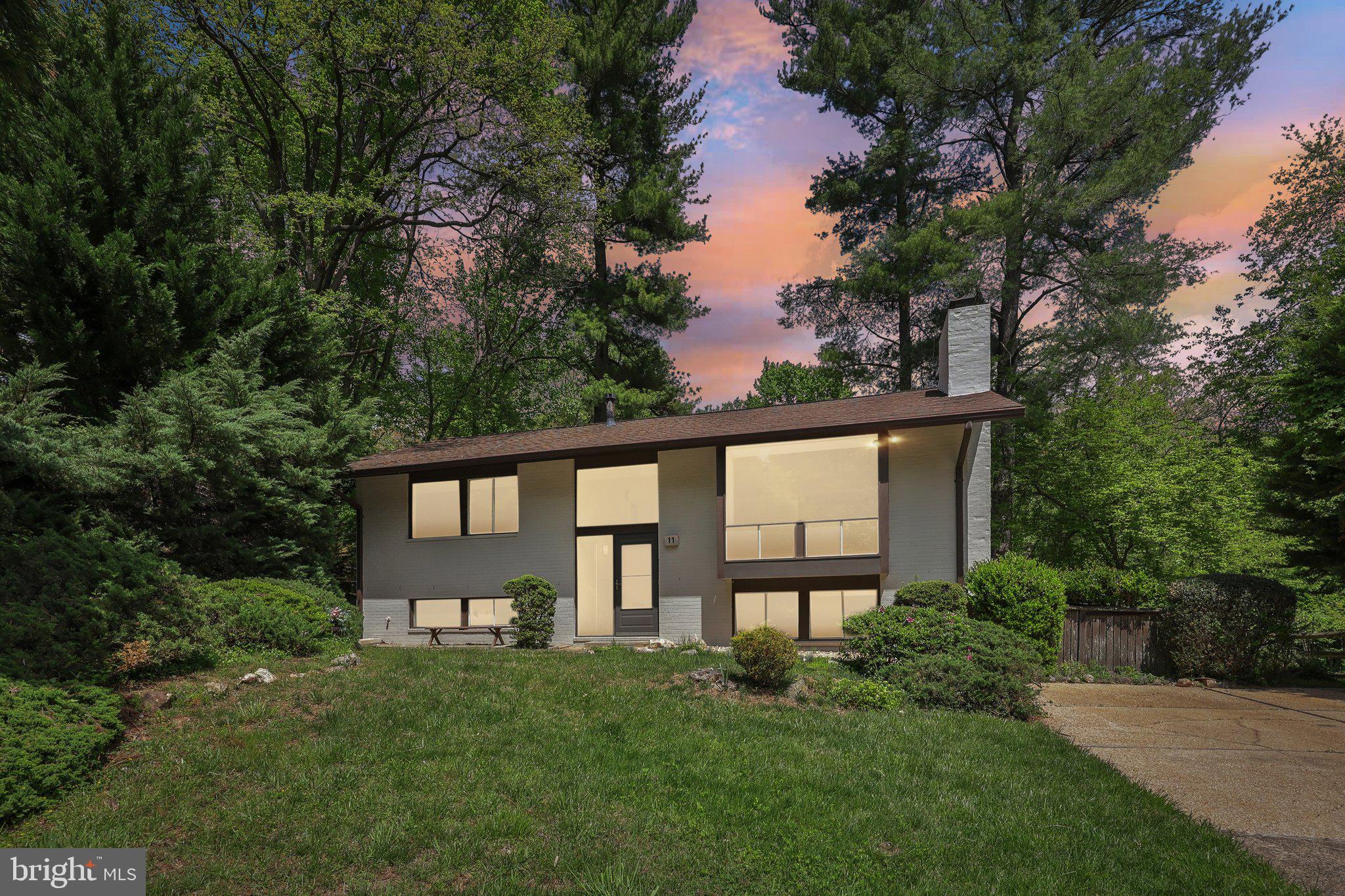 An original owner is selling her mid-century modern home ​in New Mark Commons​.  ​The living room has cathedral ceilings, prominent center wall with fireplace and large expanses of windows. This main level features wood floors throughout and also includes two bedrooms and two bathrooms.  The lower level includes a large family room, a third and fourth bedroom, large utility/storage room, third full bathroom and walk out basement.  With multiple outdoor areas and walls of glass the house was designed to bring in light and connect with the outdoors.  A planned community of detached houses and townhouses, the amenities of New Mark Commons include a beautiful lake, swimming pool, tennis courts, basketball court, clubhouse, bike paths and a tot lot. The home and neighborhood were designed by the award-winning firm of Keyes, Lethbridge & Condon and developed by Edmund J. Bennett. The neighborhood was listed in the National Register of Historic Places in 2017 and this specific home has been highlighted in academic papers and local news. The house is conveniently located just one block from the Ride On bus to the Rockville Metro and just .5 miles from Rockville Town Center and Exit 5 off I-270 toward historic Rockville.
