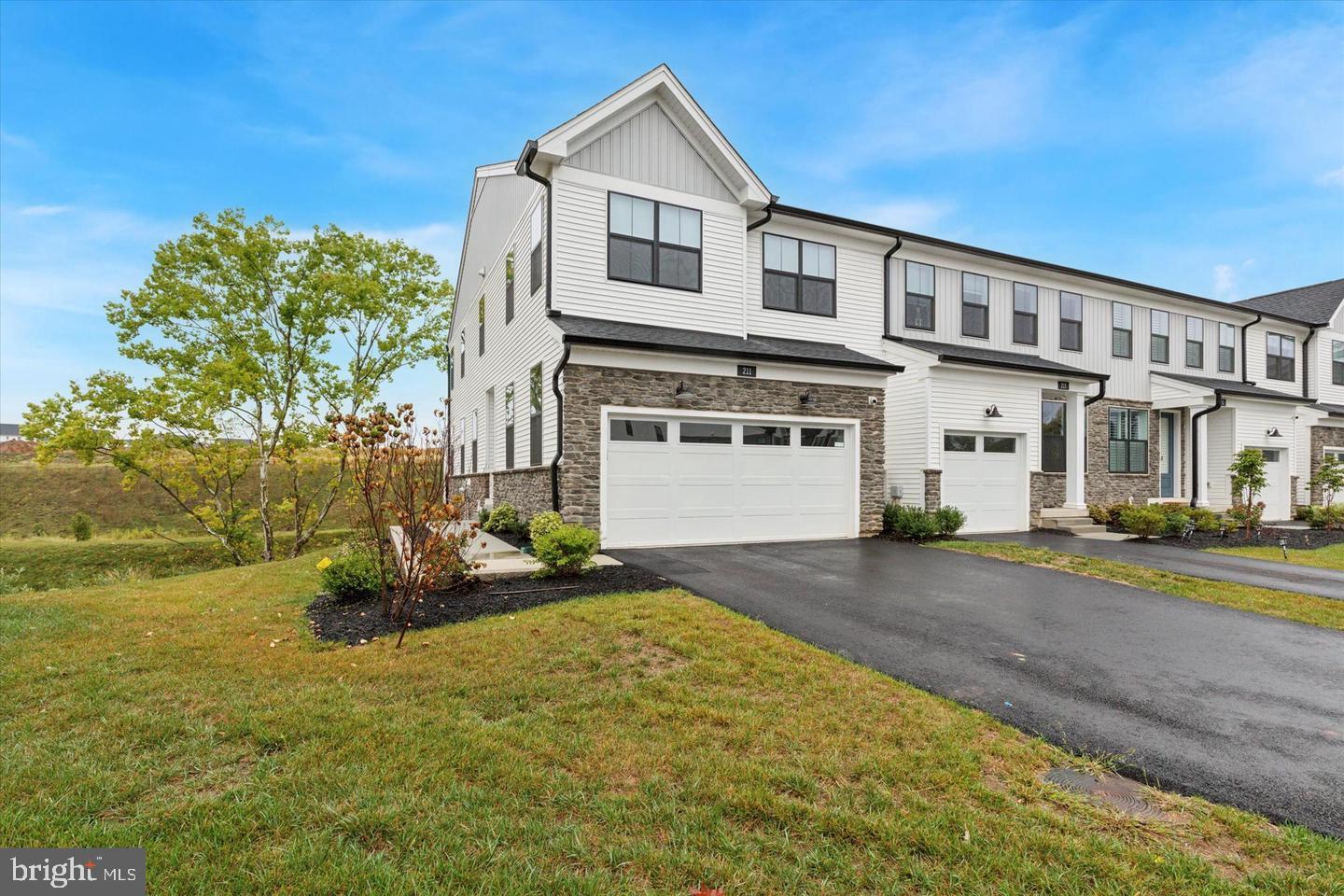 Welcome to this beautifully maintained, move in ready rarely available end unit townhome in the desirable Stonebrook at Upper Merion community, ideally located in the heart of King of Prussia. This thoughtfully designed home offers a modern open floor plan with light filled living spaces, hardwood flooring throughout, and a whole house alkaline water filtration system that enhances everyday comfort.
The main living space is designed for both daily living and effortless entertaining. Sunlit spaces flow seamlessly into the kitchen featuring granite countertops, stainless steel appliances, and abundant cabinetry. A convenient half bath and access to the large pergola covered deck create an inviting setting for morning coffee, outdoor dining, or relaxing at the end of the day.
Upstairs, the spacious primary suite offers a peaceful retreat with an en suite bathroom featuring a double vanity, upgraded stall shower, and a walk in closet. Two generously sized secondary bedrooms, a full hall bathroom, and a dedicated second floor laundry room complete the level. Motorized shades throughout the second floor provide added comfort and convenience.
Additional highlights include a walkout unfinished basement offering excellent storage and future finishing potential, along with a two car garage.
The home also conveys with several useful inclusions, including the washer, dryer, refrigerator,  patio table and chairs, and a Blackstone grill with cover.
Ideally situated just minutes from major commuter routes, the King of Prussia Mall, King of Prussia Town Center, and Valley Forge National Historical Park, residents enjoy exceptional shopping, dining, and outdoor recreation. The nearby Chester Valley Trail offers 15 miles of scenic paths perfect for walking and biking.
This home is completely turnkey and exceptionally well maintained, offering the opportunity to enjoy low maintenance living in one of Upper Merion’s most convenient locations.