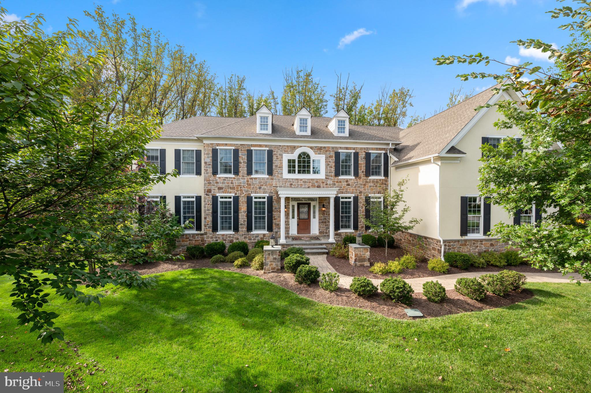 OPEN HOUSE CANCELLED. Prepare to be wowed by this exceptional estate home with many, many upgrades in Newtown Square's premier Liseter community.  This Langley model is nestled at the end of a peaceful cul-de-sac on a distinguished lot backing to open space of the Newtown Meadow Reserve. Surrounded by 50 preserved acres, this remarkable home combines architectural elegance with the tranquility of nature at your doorstep. Get the best of both wolds--live in a close knit community with top-notch amenities and social activities but also enjoy complete privacy. Thoughtfully designed across multiple levels, the home offers five luxurious en-suite bedrooms upstairs (all with new vanities with granite countertops) and three additional bedrooms on the lower level, ideal for multigenerational living or hosting guests in comfort. The heart of the home centers on an impressive two-story great room, extended an additional eight feet to maximize space and natural light. Formal living and dining rooms provide sophisticated settings for memorable gatherings, while the expansive gourmet kitchen, featuring stainless steel appliances, huge island with prep sink, dual drawer refrigerators, and dedicated serving area, flows into a bright sunroom overlooking serene garden views. The current owners opted for the "3-story Elite Guest suite addition" which includes a peaceful versatile bonus room on the first level which adapts to your needs as a second office, library, music room, or creative space. A half bath, office, laundry room and 3 car garage complete this floor. On the second level, the primary suite serves as a personal sanctuary, complete with a peaceful sitting area and three custom walk-in closets. Entertainment options abound on the fully finished lower level, showcasing a custom theater, wet bar with dual refrigerators, and dedicated fitness studio, bringing resort-style amenities home. Architectural distinction defines every corner: a striking butterfly staircase, coffered ceilings, rich wood beams, wood accent walls and exquisite millwork create lasting impressions. A secondary back staircase adds convenience, while integrated AV and Control4 automation will impress any techy. . Three separate HVAC systems ensure personalized comfort throughout. Outside, enjoy a two-tiered deck with built-in sound, an inviting paver patio, and professionally maintained landscaping with full irrigation. An impressive front hardscape and expanded entry make every arrival feel special. Liseter's country club lifestyle includes a resort-style pool, state-of-the-art fitness center, basketball, tennis, pickleball and bocce courts, and over 4 miles of scenic walking trails. The beautifully appointed community barn provides an elegant entertaining venue. A short drive to the prestigious Episcopal Academy and acclaimed Marple Newtown Schools, Liseter offers easy access to Ellis Preserve's Whole Foods, outstanding shopping and dining, and popular country clubs including Aronimink and Waynesborough. Enjoy quick access to the airport, Center City Philadelphia and  Paoli's Amtrak service to New York.