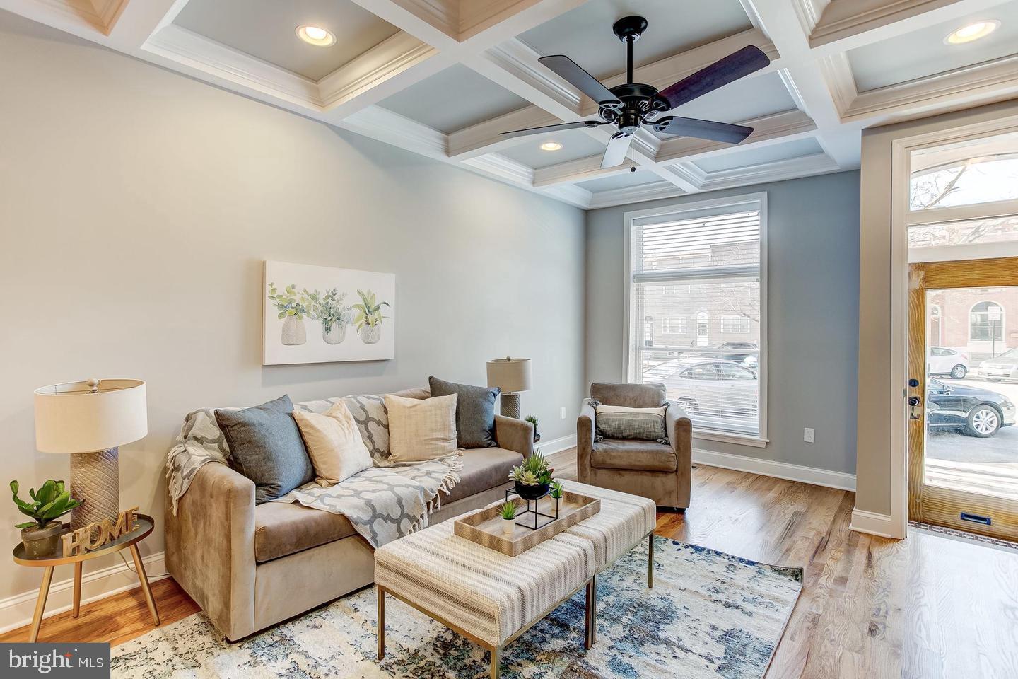 BRAND NEW 14+ FT WIDE CHAP RENOVATION BY CUSTOM HOMEBUILDER MASON PROPERTIES LOCATED IN THE HEART OF LOCUST POINT ON EXTREMELY SOUGHT AFTER BLOCK. OVERSIZED OFF STREET GARAGE PARKING. GLISTENING HARDWOODS CASCADE THROUGHOUT. ENJOY CUSTOM CABINETRY, UPGRADED TRIM AND PAINT PACKAGE, IMPORTED TILE, GRANITE COUNTERTOPS, HIGH END SS APPLIANCE PACKAGE IN DESIGNER CHEF'S KITCHEN. LOADS OF NATURAL LIGHT. EXPOSED BRICK. FINISHED LOWER LEVEL. HIGH CEILINGS. TONS OF STORAGE. WALK-IN SHOWERS. WALK-IN CLOSETS. LOW TAXES. SPACIOUS 3 BEDROOMS WITH 3.5 BATHROOMS. EXPANSIVE ROOF DECK AND PRIVATE OUTDOOR COURTYARD - GREAT FOR ENTERTAINING. CLOSE PROXIMITY TO RETAIL SHOPPING, LOCAL DINING, AND ALL MAJOR HIGHWAYS. SCHEDULE A PRIVATE TOUR TODAY.