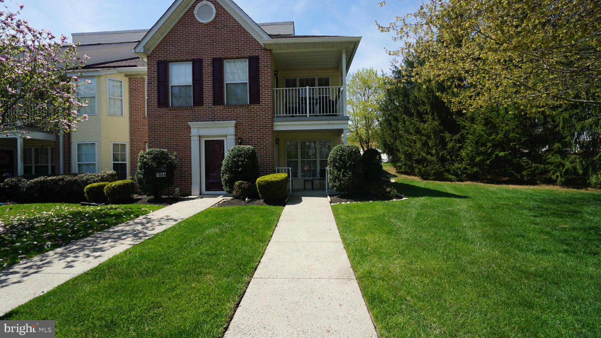 Beautifully maintained move-in-ready home located in the sought-after Salem Manor. This 55+ community offers all the comforts of one-floor living at its best. Rarely offered 2-bedroom, 2 full bath located on the FIRST floor and is a CORNER unit! Private front porch, Step into the foyer with a built-in closet, and enter the living room. large modern kitchen with a breakfast room, HVAC, and a hot water heater, all installed in 2025. Hall Laundry room, full hall bath with stall shower. Bedroom #2 has an oversized walk-in closet, and the Main Bedroom has its own bath & walk-in closet, plenty of space. Short walking distance to the mailboxes and clubhouse.