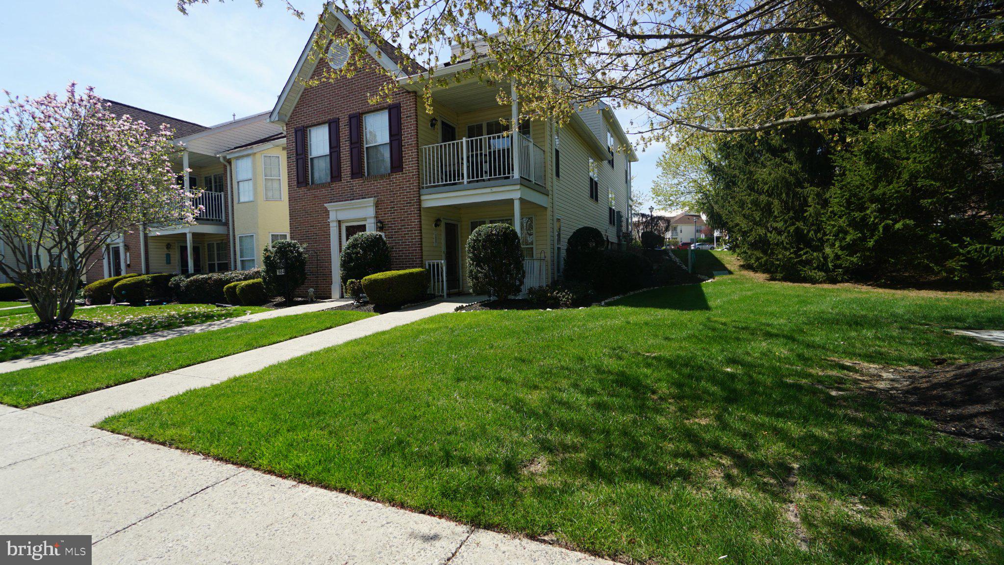 Beautifully maintained move-in-ready home located in the sought-after Salem Manor. This 55+ community offers all the comforts of one-floor living at its best. Rarely offered 2-bedroom, 2 full bath located on the FIRST floor and is a CORNER unit! Private front porch, Step into the foyer with a built-in closet, and enter the living room. large modern kitchen with a breakfast room, HVAC, and a hot water heater, all installed in 2025. Hall Laundry room, full hall bath with stall shower. Bedroom #2 has an oversized walk-in closet, and the Main Bedroom has its own bath & walk-in closet, plenty of space. Short walking distance to the mailboxes and clubhouse.