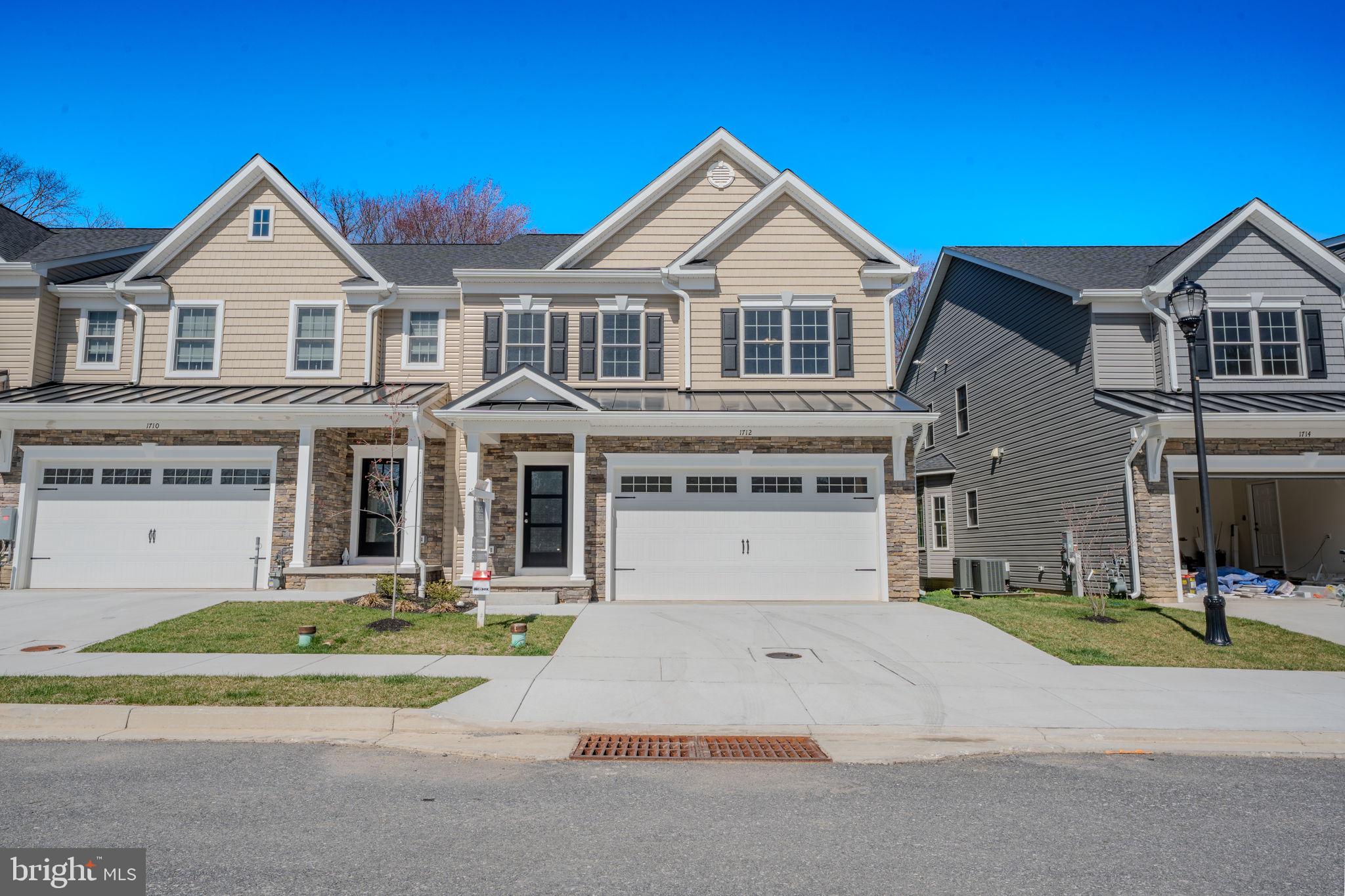 OPEN HOUSE ON SATURDAY FROM 12 TO 3! IMMEDIATE DELIVERY NEW HOME!! NEW 55 & Older luxury End of Group Ready for Immediate Occupancy! Eldersburg's newest 55 & older community,  Doroly Gardens upscale Villas, small enclave of 28 total units when completed! Custom, Quality Built by Patton Homes, building in Carroll County for over 40 years! Builder can make modifications to the unit if necessary! CHECK OUT THE VIRTUAL TOUR VIDEO in MLS, click on movie reel icon at top of listing or scroll thru Internet listing to see video. Two by Six exterior construction, Andersen tilt windows & slider. Recessed Fire Sprinklers. First floor features solid 5" wide hardwood floors, Powder room with quartz counters, taller soft close vanity & larger ceramic tile floor. First floor laundry room with large ceramic tile floor. Gourmet kitchen with hardwood floors, island with breakfast bar, upgraded quartz counters, backsplash tile, white Shaker cabinets, soft close doors & drawers, stainless steel appliances include: gas range with oven that includes the Air Fry feature, under counter convection wall oven (2 ovens total) dishwasher & microwave plus garbage disposal. pendant lighting, LED under cabinet lights & recessed lighting. Bay window table area. Great Room with hardwood floors, vaulted ceiling, gas fireplace with marble surround, celling fan, sliding door to covered rear porch. First Floor Owner's suite with hardwood floors, tray ceiling & ceiling fan, ensuite owner's luxury bath with taller double vanity, quartz counters, large shower, linen closet & large walk-in closet also with hardwood floors. Steps to second floor with hardwood treads, white poplar risers to loft area. The huge Loft are is great for additional TV area, studio or office with hardwood floors, ceiling fan and recessed lighting. Located off of the loft is a large separate storage room.  Plus 2 additional large bedrooms, each with hardwood floors, walk-in closet & ceiling fan. Second floor large full bath with double sinks, taller vanity, quartz counters, tub & commode in a separate room, large hall storage closet. Plus there is a huge unfinished basement that can be completed at an additional cost if needed. There is a full bath rough-in, wet bar rough-in, a basement door exit with a couple steps up to yard plus an egress window exit too for extra light in  the basement. The Trane HVAC is 2 zones- heat pump with natural gas back-up heat, public water & sewer. Builder offering $5,000 to closing if you use their recommended lender. 2 end units ready for quick occupancy and more units under roof. Convenient access to Routes 32 & 26. Close to shopping centers and restaurants! Open every Saturday 12 -3 pm or call agent to make an appointment to view units on other days. TAXES LISTED ARE FOR THE LOT ONLY!