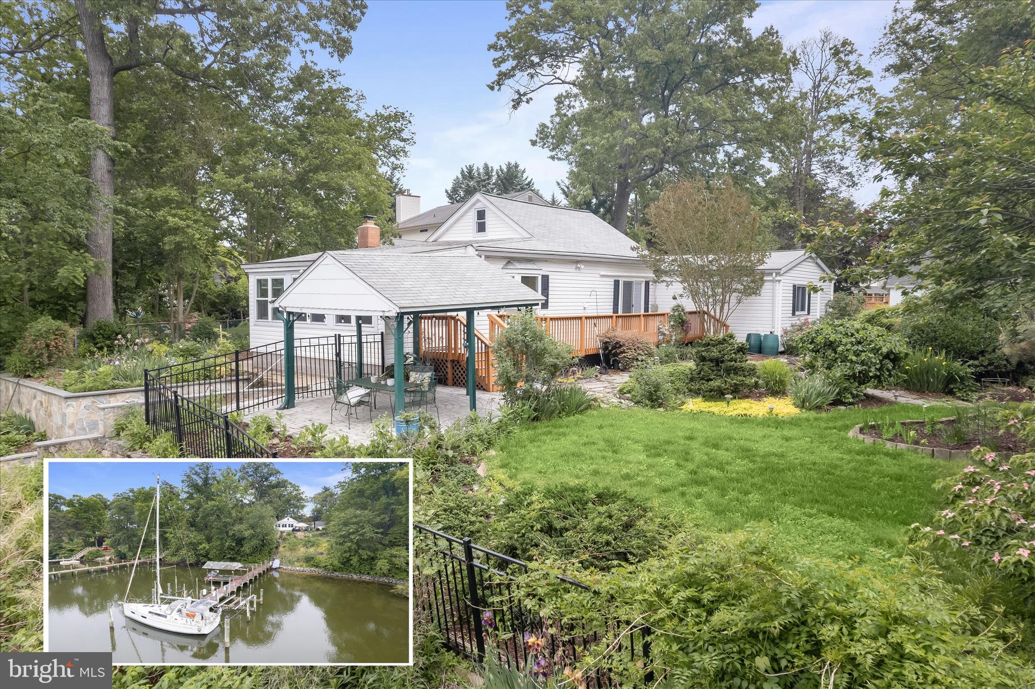 Set along the sheltered banks of Stony Creek, this nearly one-acre waterfront retreat offers a rare opportunity to enjoy Chesapeake Bay living with approximately 198 feet of riparian waterfront, a 135-foot dock with sailboat slip, and two boat lifts rated for 12,000 and 16,000 pounds. Save the ongoing expense of hauling and storing your sailboat by lifting her directly from your own dock after a day on the water. A covered 16 x 12 pavilion extends the shoreline experience, creating a welcoming setting for relaxing, entertaining, or simply enjoying the peaceful waterfront surroundings. Positioned approximately 48 feet above mean high water, the property captures sweeping views while offering a sense of privacy and elevation above the creek.

Designed for easy one-level living, the ranch-style residence blends everyday comfort with a deeply connected, water-oriented lifestyle filled with kayaking, canoeing, wildlife watching, and endless sunsets reflected through expansive windows overlooking the water. Inside, the living room is framed by captivating waterfront views and anchored by a large red brick wood-burning fireplace with a variable speed blower insert that creates warmth and character throughout the adjoining living and dining spaces.

A 2019 renovation thoughtfully updated the kitchen, living room, and dining room with insulation added to exterior walls, new windows including a bay window in the kitchen and a box window in the dining room, new front and rear doors, and movie accent lighting. The renovated kitchen features sparkling quartz counters, stainless steel appliances including a range and wall oven, a pantry, and a convenient pass-through to the dining room that keeps the layout open and connected.

The home offers three bedrooms and three full baths, with two bedrooms featuring ensuite baths. New sliding glass doors in all three bedrooms create seamless indoor and outdoor flow to the surrounding decks. The expansive 20 x 20 primary suite includes private deck access and a remodeled ensuite bath completed in 2025, while new baseboard heaters installed in 2026 add comfort. Energy-efficient split units installed in 2019 provide heating and cooling throughout much of the home, complemented by an oversized efficient water heater for long, relaxing baths.

Outdoor living is woven throughout the property. A custom paver patio topped by a pergola creates an inviting gathering space, while the grounds showcase easy-care landscaping filled with native plantings, pollinator gardens, spring blooming bulbs, and host plants that attract butterflies and birds alike. A lovely 5,000-gallon koi pond with a stone waterfall adds to the tranquil atmosphere, joined by terraced natural stone gardens, a freshwater bog near the shoreline, a sturdy handmade wisteria arbor with a wooden lawn swing, and fenced areas for both privacy and pets.

The partially finished lower level adds flexible usable space currently serving as a studio, along with extensive shelving, a large wine rack, and a resurfaced cement laundry sink completed in 2026. Additional storage is found throughout the property, including attic storage in both the home and the detached two-car garage, which also features new electric garage doors installed in 2024. An Amish-built 12 x 24 shed with two lofts, circular driveway, and ample off-street parking further enhance the property’s functionality.

Ideally located, the home offers convenient access to waterfront recreation at Downs Park and Fort Smallwood Park, along with nearby dining at Mike's Crab House North, Bahama Mike's, and Kent Island Crab Co.. Boating access is nearby at Atlantic Marina on the Patapsco, while shopping, everyday conveniences, and commuter routes to Baltimore and Annapolis remain within easy reach. Please note: some photos have utilized virtual staging.