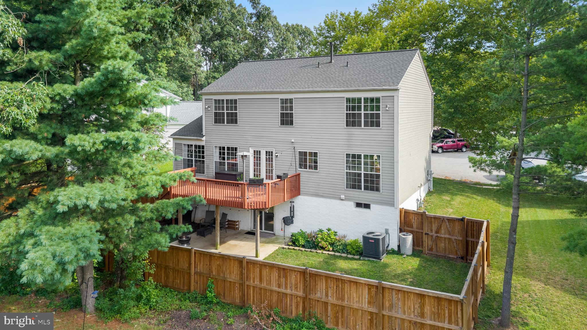 Welcome to this beautifully updated 5-bedroom, 3-full and one half bath home in Anne Arundel County, ideally located near major commuter routes for easy access to Baltimore, Washington, D.C., and surrounding areas. Thoughtfully enhanced since its last sale, this move-in-ready home offers the perfect blend of modern style, functionality, and convenience.

Inside, you'll find a fully renovated basement featuring luxury Luxury Vinyl Plank flooring throughout, providing additional living and entertaining space. The spacious owner's suite has been upgraded with a custom California Closets system, offering boutique-style organization and exceptional storage. Additional upgrades include a hardwired Level 2 EV charger and a deck with stairs leading to the backyard.
Outside, enjoy a fully fenced backyard, professionally designed landscaping, and established greenery that creates a private, inviting outdoor retreat. Combining extensive updates, generous living space, and a prime commuter-friendly location, this home is truly move-in ready and waiting for its next owner.