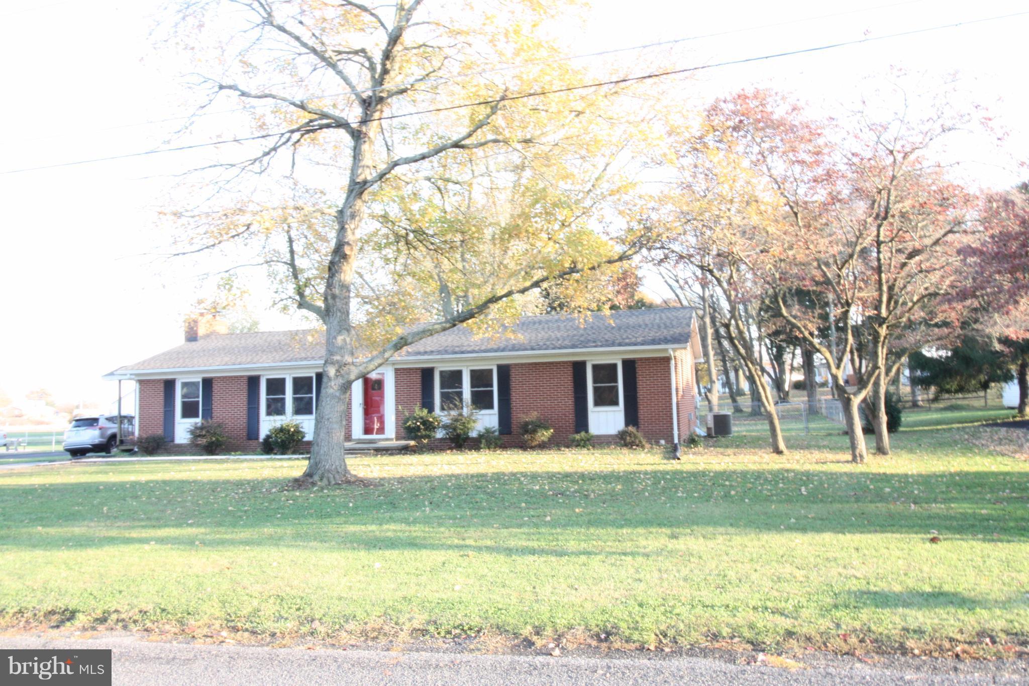 Here is your quiet place in the country....charming 60s all brick rambler on a basement sits on 1/3 acre of level fenced land.  Open and inviting floor plan for entertaining.  Brand new roof and new sundeck, new washer & dryer, new hot water heater, new shed, windows replaced  Basement is an open canvas for your preferred design.   No HOAs !  So many possibilities here!  3% CLOSING HELP FOR BUYERS