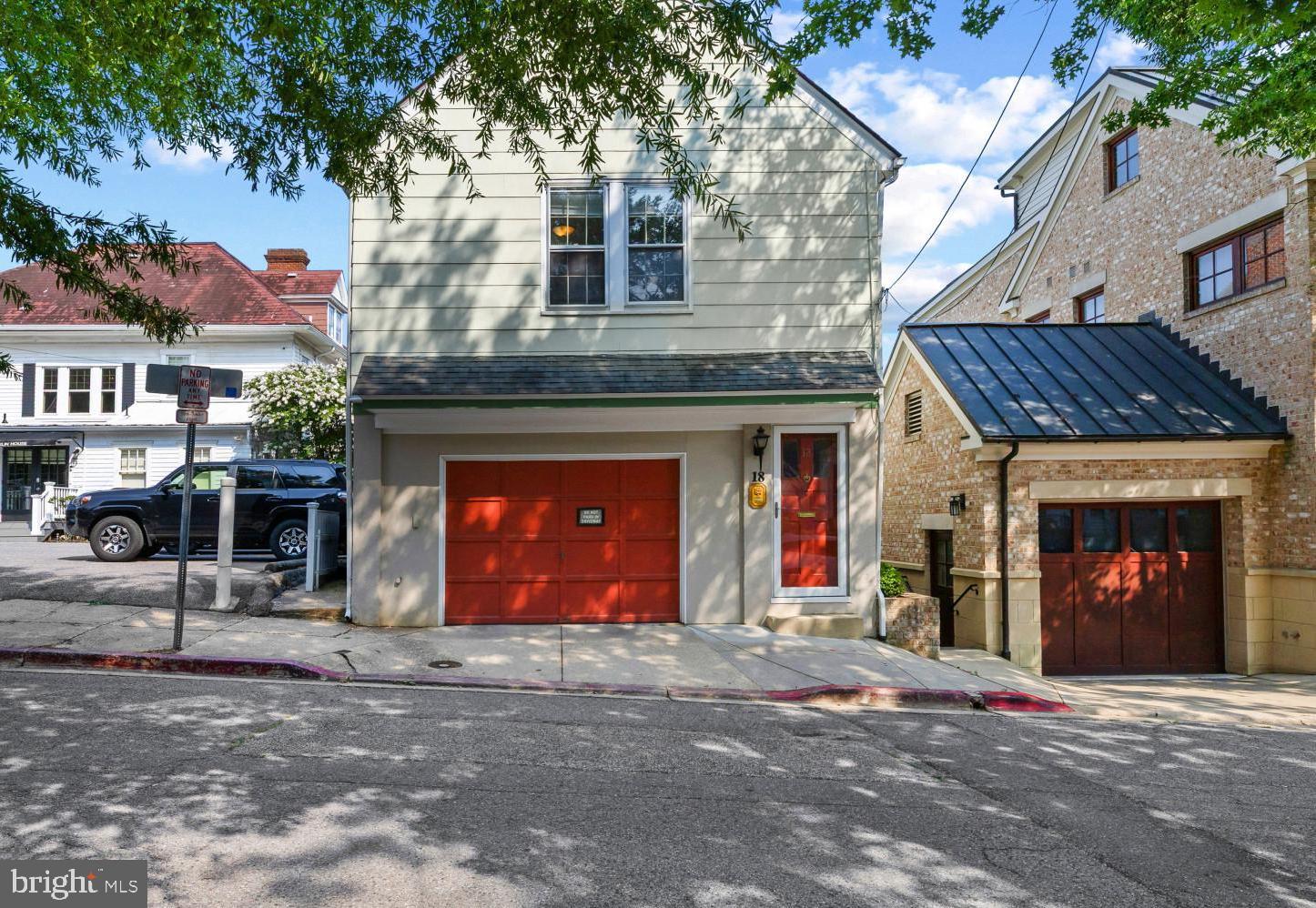 Tucked along a quiet one-way street in the heart of Historic Downtown Annapolis, this charming residence offers the perfect blend of character, convenience, and an exceptional in-town lifestyle. Leave the car behind and enjoy easy access to waterfront parks, City Dock, award-winning restaurants, boutiques, coffee shops, the Naval Academy, and all of the events that make downtown Annapolis such a sought-after place to call home.

A rare one-car garage provides coveted off-street parking and is complemented by a versatile finished space on the entry level—complete with its own private entrance and half bath—making it ideal for a home office, studio, fitness room, or countless other possibilities. Upstairs, the light-filled main level is warm and inviting, featuring an updated kitchen with granite countertops and high-end appliances that flows seamlessly into the cozy living room centered around a fireplace. Just beyond, the adjoining sunroom creates a bright and relaxing space with access to a private balcony, perfect for morning coffee or unwinding after a day on the water or exploring town.

The spacious bedroom enjoys an attached bath that also functions as a convenient powder room for guests, creating a thoughtful and efficient layout. Whether you're searching for a full-time residence, an easy lock-and-leave weekend getaway, or the perfect Annapolis pied-à-terre, this delightful home offers an opportunity to enjoy one of the city's most desirable downtown locations with the rare luxury of a garage. Welcome Home!