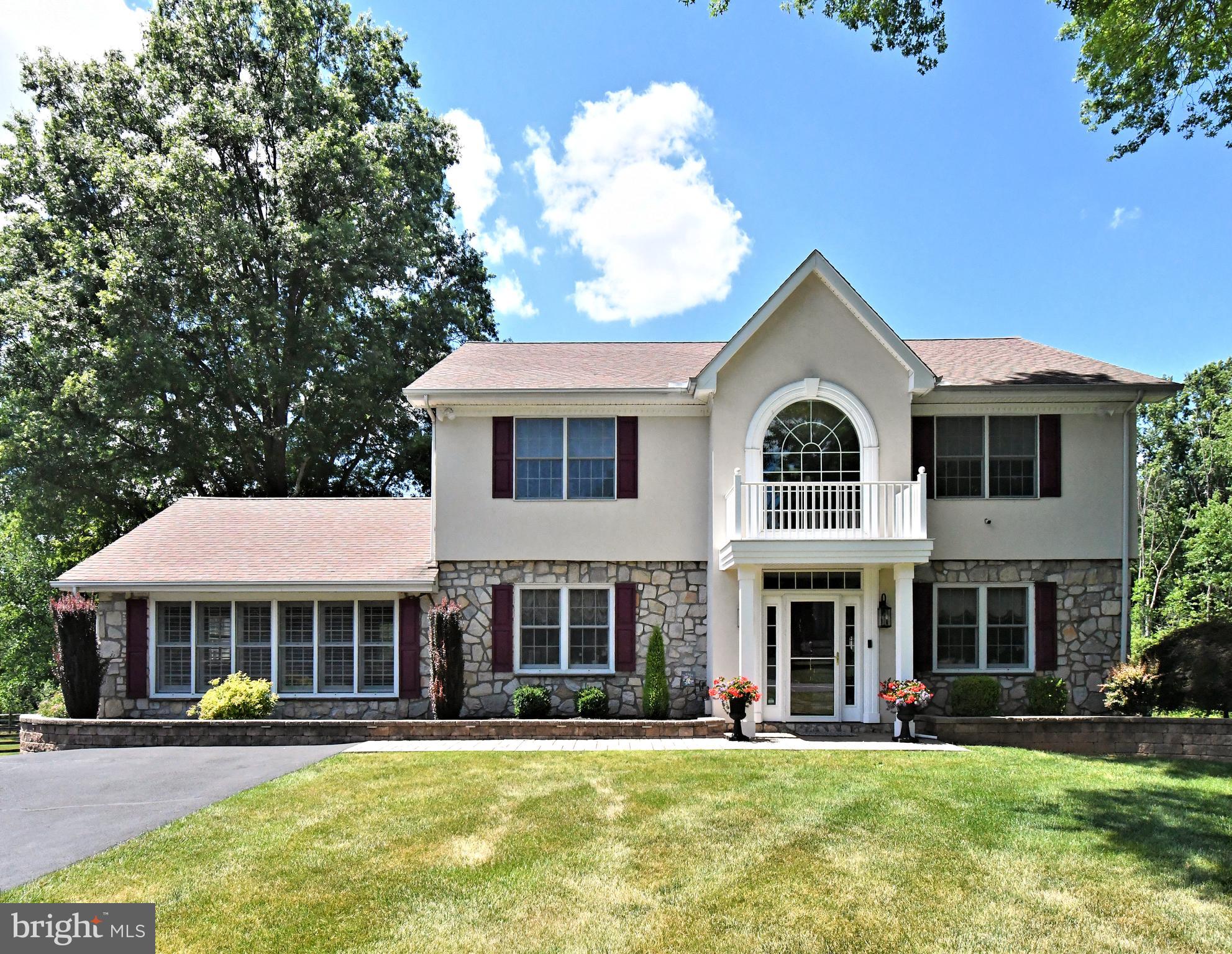 Welcome to 1651 North Wales Road, a beautifully maintained and thoughtfully updated home offering over 4,400 total square feet of finished living space, set on 1.5 private acres in Methacton School District. With approximately 3,178 square feet above grade plus an additional 1,224 square feet in the finished walk-out lower level, this home offers an exceptional amount of space, comfort, and flexibility both inside and out.
While located along North Wales Road, the home is privately set back, creating a peaceful and surprisingly serene setting from the moment you arrive. The rear of the property is truly special, with mature surroundings, a private natural backdrop, and beautiful views from both the expansive upper deck and the walk-out lower-level patio. The sellers have especially enjoyed the privacy, quiet outdoor spaces, and the wildlife often seen from the backyard.
Originally remodeled in 2006 with extensive upgrades, this 4-bedroom, 3.5 bath home has been lovingly maintained, and it shows in every detail. A welcoming foyer with detailed trim, wainscoting, crown molding, and a beautiful staircase sets the tone for the home’s warm and refined interior. The main level offers generous living spaces, including a formal living room with rich hardwood flooring, detailed millwork, and abundant natural light, as well as a formal dining room with hardwood floors, wainscoting, crown molding, a decorative ceiling medallion, and an elegant chandelier, creating a wonderful setting for holidays, entertaining, and special gatherings.
The kitchen is warm and inviting with abundant wood cabinetry, granite countertops, stainless steel appliances, tile backsplash, recessed lighting, and a spacious layout that flows beautifully into the breakfast area and adjoining living spaces. The breakfast area features custom built-in cabinetry, large windows, and stylish lighting, adding both character and everyday functionality. Just beyond, the covered rear deck becomes an extension of the living space, offering an incredible place to relax, dine outdoors, or simply enjoy the peaceful rear yard.
A comfortable family room provides another inviting gathering space with vaulted ceiling, recessed lighting, ceiling fan, rich flooring, and a stone fireplace that creates a beautiful focal point. The home also includes a private office with French doors, ideal for working from home, study space, or additional flex use. The primary suite offers a spacious retreat with multiple windows, recessed lighting, crown molding, ceiling fan, updated flooring, and direct access to a beautifully finished bath with tile, granite, custom cabinetry, large mirror, and soaking tub.
The finished walk-out lower level adds incredible versatility with bright recessed lighting, updated flooring, generous open space, storage, exterior access, and room for recreation, office, fitness, guest space, or multi-purpose living. With its walk-out design, full bath access, and flexible finished space, this level offers wonderful potential for in-law quarters, extended family, guest space, or multi-generational living.
The exterior setting is one of the home’s most memorable features. Enjoy coffee on the deck, quiet evenings on the patio, or time outdoors overlooking the peaceful 1.5-acre property. A detached two-car garage adds convenience, storage, and flexibility. Additional important features include public water connection, although public records may still reflect well water, a well-maintained septic system, and a newer second-floor air conditioning installed May 2026 with warranties.
This is a rare opportunity to own a spacious, updated, and exceptionally well-maintained home with over 4,400 finished square feet, 1.5 private acres, a walk-out finished lower level, detached two-car garage, public water, and a peaceful backyard setting in Methacton School District. A wonderful combination of space, privacy, condition, and location. 🏡