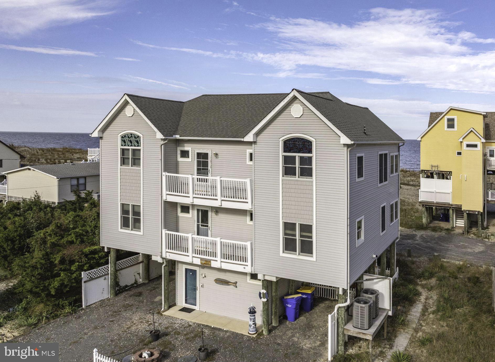 Use a 2 Units or 1 large home.....Elevator, views and more! Discover coastal charm and versatility in this Broadkill Beach retreat, offering breathtaking views and a layout designed for both relaxation and opportunity. Set on a spacious double lot measuring 75x118, this beautifully maintained 3-bedroom, 2.5-bath home is thoughtfully arranged as two units, providing flexibility for rental income or multigenerational living. The property is currently set up for short-term rentals, with one unit renting for $350 per night or the entire home for $700 per night.

New roof in 2025. Built in 2006 and freshly painted, the home showcases quality updates and features throughout, including two new heat pump systems (installed in 2023 and 2024), a tankless hot water heater, and an elevator that is serviced annually for convenience and peace of mind. Elevator on all levels and entry to the elevator from the ground floor allow for ease of access and handicap accessibility. Other features include grab bars and safety handles in the bathroom.

Inside, enjoy open and inviting living spaces accented by luxury vinyl plank and tile flooring, with a cozy gas fireplace on each level creating warmth and charm. Both floors feature sunrooms/enclosed porches—perfect for year-round enjoyment—along with Juliet balconies that capture the natural beauty of Broadkill. The upper and lower decks provide additional space for outdoor dining, entertaining, or simply taking in the bay breezes and serene refuge views, which are protected and will remain unobstructed.

Additional highlights include a spacious attic with pull-down stairs for storage, an outdoor shower for rinsing off after beach days, and the benefit of being sold mostly furnished, making it truly move-in ready. 

Experience the best of coastal living—where peaceful views, thoughtful design, and rental potential come together in perfect harmony at Broadkill Beach.