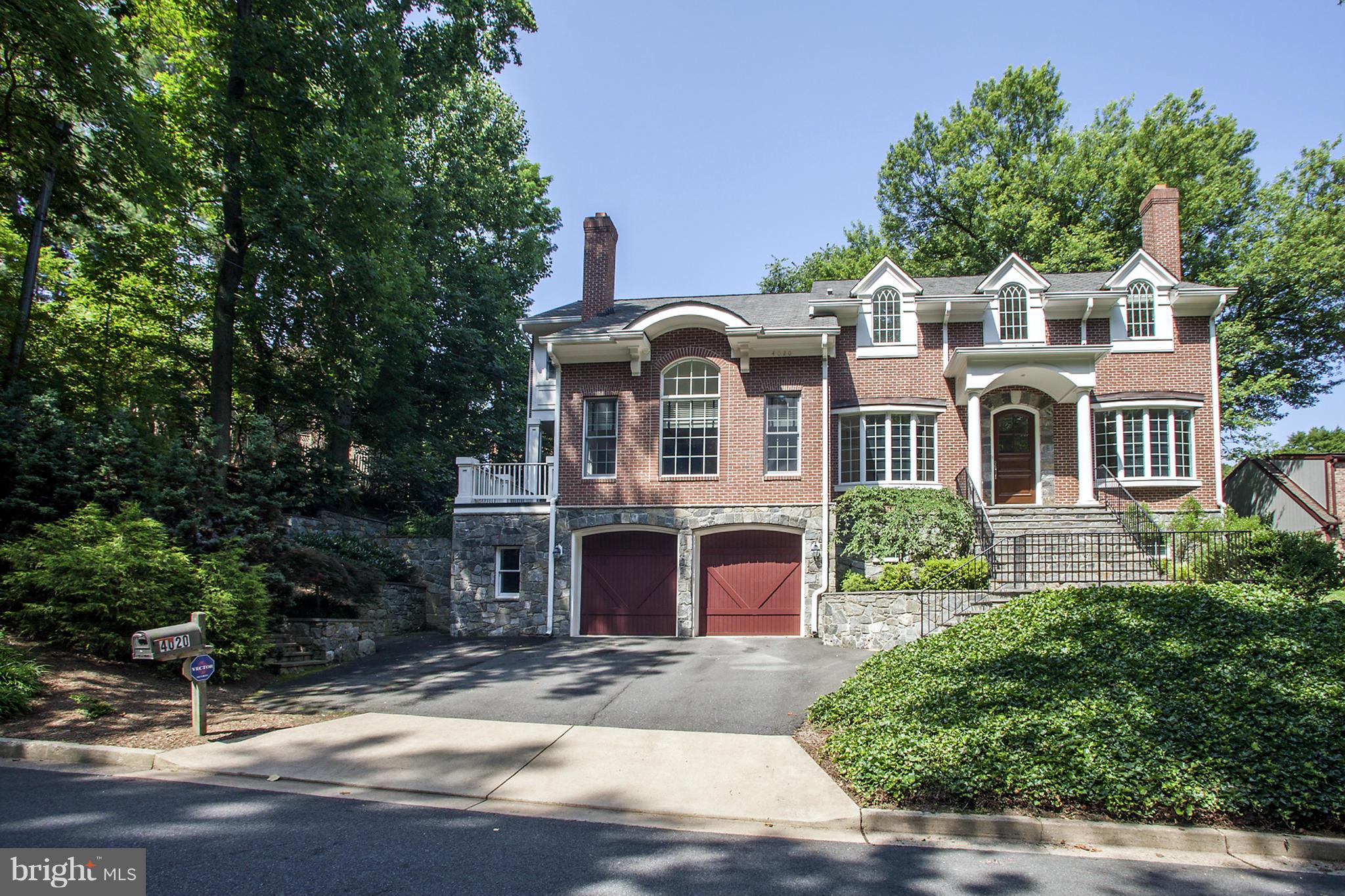 Beautiful brick colonial, 5 bed 4 and a half baths, 3 finished levels, deck, manicured landscape.  Open foyer and hardwood floors throughout, professionally finished interior, gourmet kitchen and custom cabinetry, oversized island, granite counters, media room, exercise room, large recreational space. Perfect for entertaining and everyday living.
