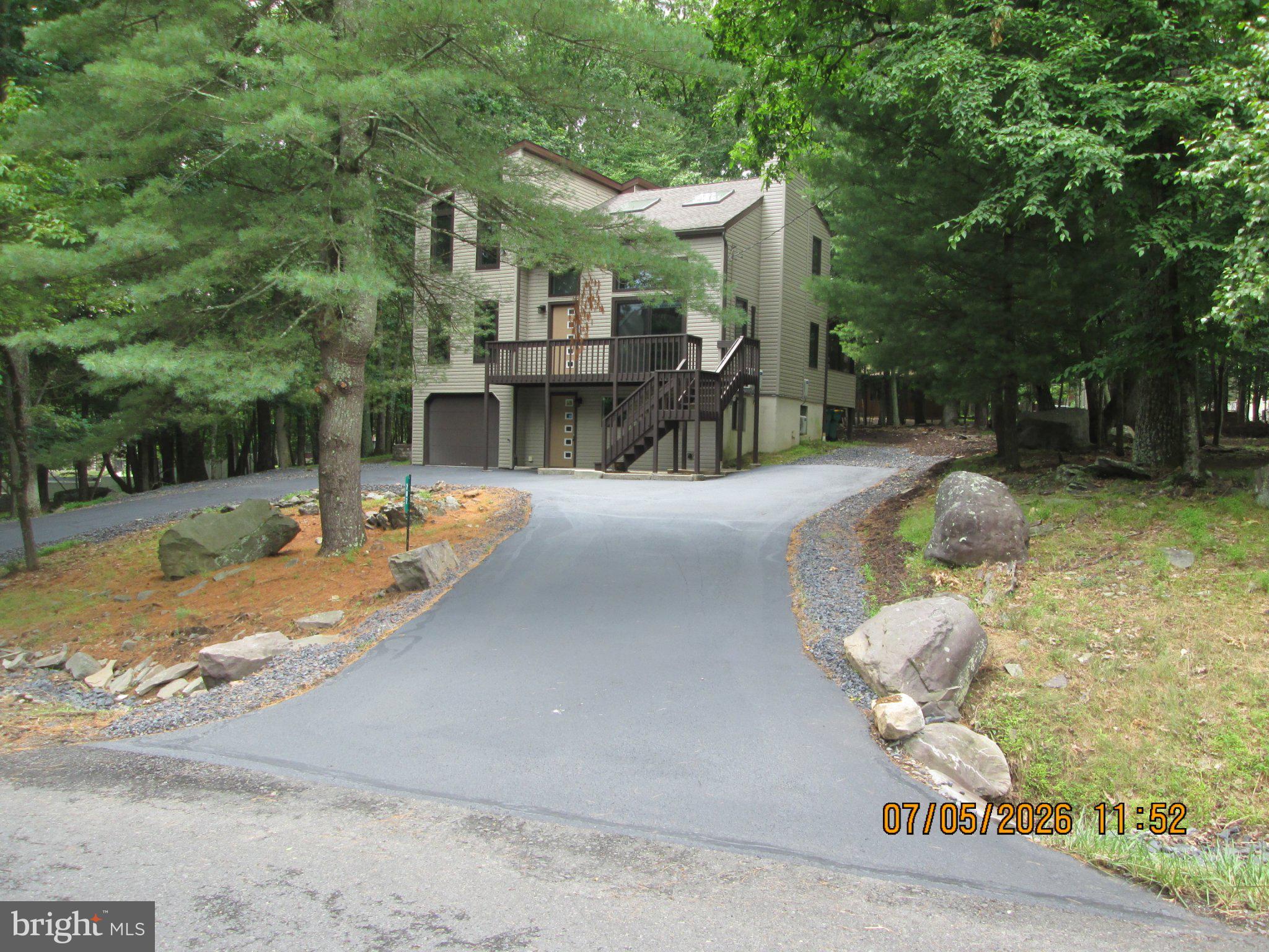 All new inside and out!! Low taxes only $3789, located in highly sought after STR popular and successful amenity filled Penn Estates. The Exterior features all new 3 efficient ductless mini splits, new vinyl siding, soffit, fascia, gutters and downspouts, stained decks, coated handrails, sealed paved U shaped driveway, stone, mulch and more. The interior features all new kitchen, SS Samsung appliances, new vanities, toilets, 2nd floor shower, faucets, attractive LED lighting, BB electric heaters with digital thermostats, 1 of the two water heaters, all new paint, waterproof LVP flooring, cable rails, door hardware, new garage door opener, and more. Some new windows, many others replaced in 2013 along with the roof and skylights. This model home is very popular for STR and has many attractive features such as soaring vaulted ceilings, skylights, a loft overlooking to below, offering at least one bedroom and a bathroom on all three levels, two front entrances, and a U shaped driveway, and being low maintenance. The lower level has its own front entrance, a half bath, and is flex use with a room divider so your guests can enjoy as an open family room and then bedroom with the room divider. Penn Estates is amenity filled with lakes, beaches, outdoor pool, tennis courts, basketball courts, dog park, fitness center, and gated security. This property is move in ready and a great option for STR, primary, vacation, or traditional rental. Seller is a licensed Realtor and acquired the property through distressed sale and therefore has limited knowledge of the property. All measurements approximate and to be verified by the buyer. NO FHA or Va financing at this time. Buyer to perform any due diligence for any required use.