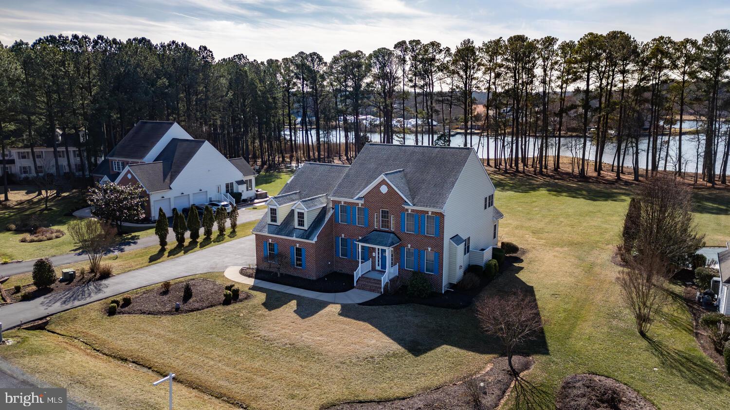 Welcome to 112 Port Court, Grasonville, MD  the best of Eastern Shore Waterfront living

Nestled in the serene Homeport community, this stunning waterfront colonial home offers unparalleled luxury and comfort. Built in 2004, this 3,889 sq. ft. residence boasts 4 spacious bedrooms and 3.5 bathrooms, including two primary suites—one on each floor. The open-layout kitchen, perfect for entertaining, flows seamlessly into the large family and dining rooms.

Enjoy breathtaking views of Winchester Creek from the large screened-in/glass porch and maintenance-free Trex decking, with awning and hot tub.  The property includes a deeded 40 x 16’ slip with a 20,000# lift at the community marina, just a short walk away.
Additional features:
- Office with fireplace
- Bonus room with ample storage
- Three-car garage plus additional parking
- Easy access to Route 50 and a 10-minute commute to the Bay Bridge
- Close to shopping, restaurants, and the Kent Island Cross Trail
Don't miss the opportunity to make this beautiful waterfront home yours! Owner does need to secure a rental prior to sale