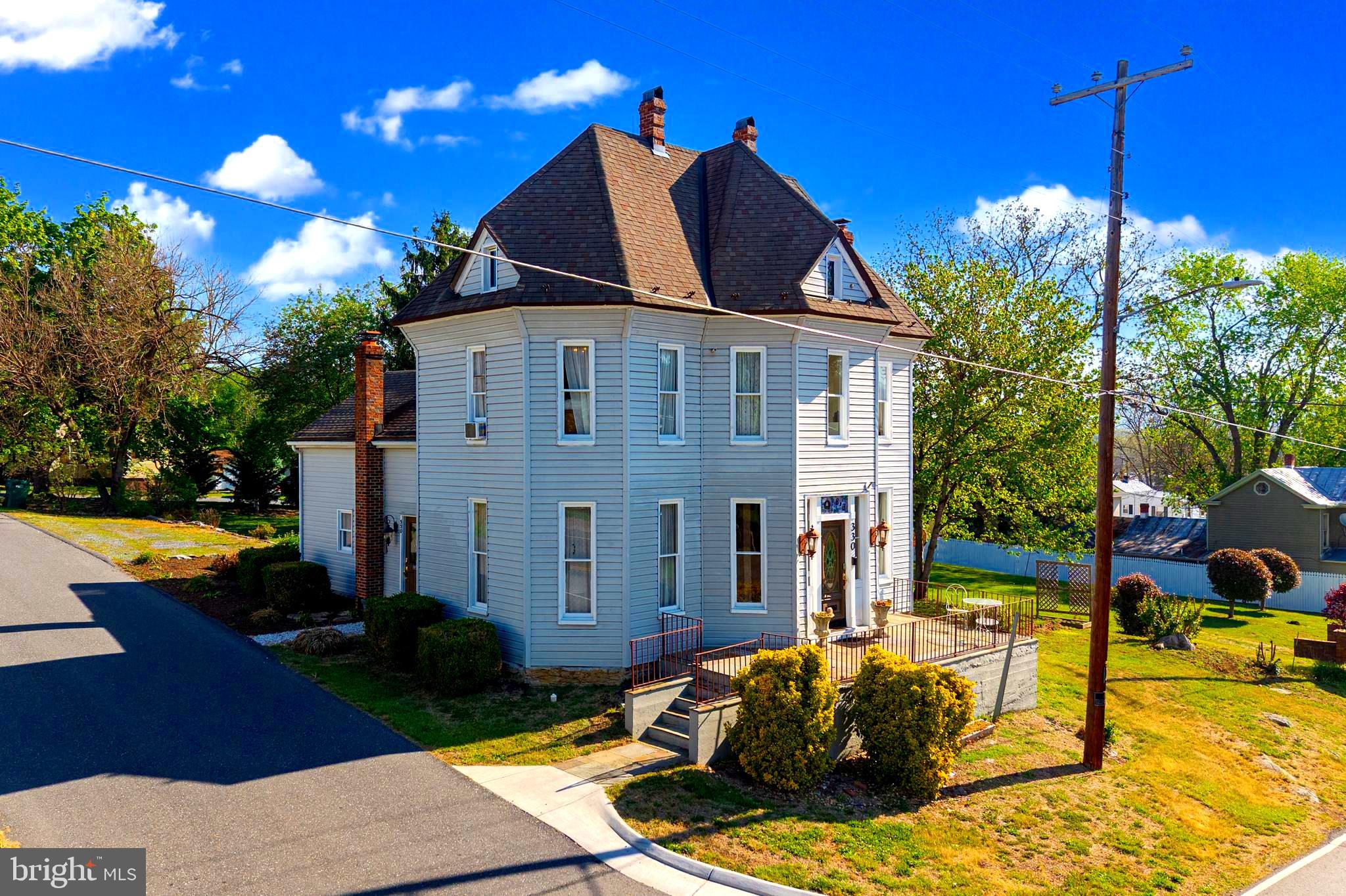 Enter into timeless charm with this fully furnished, former historic Bed & Breakfast, thoughtfully modernized for comfortable single-family living. Rich with authentic character and unique architectural details, this one-of-a-kind home blends classic appeal with today’s conveniences. Inside, you will find an updated kitchen featuring stainless steel appliances, spacious living areas perfect for entertaining or everyday life, and inviting rooms filled with warmth and charm. Four bedrooms, each with its own private bathroom, provide exceptional privacy, convenience, and flexibility. Outside, enjoy a large lot complete with a spacious deck, gazebo, and plenty of room to relax or gather. Conveniently located just a short distance from Downtown Luray, the Hawksbill Greenway, Luray Caverns, and local shops and restaurants, this unique property offers history, charm, and modern comfort all in one.
