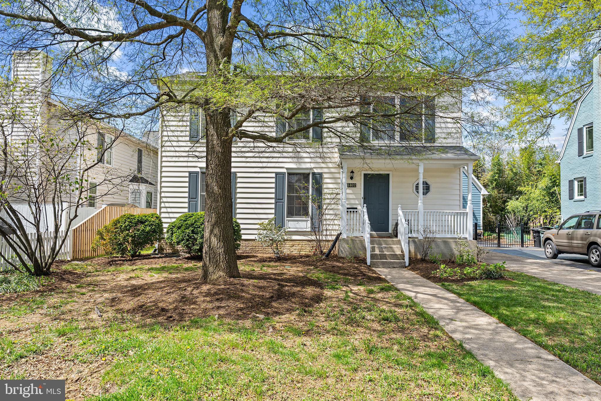 Perfectly located colonial near parks, schools and Metro offers a lifestyle of effortless enjoyment. As you step inside, you're greeted by a fresh, inviting atmosphere. Every detail has been meticulously attended to, from the freshly painted walls to the seamless flow of the floor plan. Brand new kitchen is in the heart of the home and has been completely remodeled with brand new white cabinets, luxurious quartz countertops and stainless steel appliances. You will also love the large pantry, the window above the sink looking into the back yard and recessed lighting. Main level features hardwood flooring, wood burning fireplace, a separate dining room and plentiful space for family and guests. Step outside onto the inviting deck, where morning coffees, family dinners, and bird watching sessions become your new favorite rituals against the backdrop of lush greenery and mature trees. All well sized bedrooms have brand new carpet and plenty of light. The bathrooms have been tastefully updated for a modern touch. The full basement with tall ceilings offers endless possibilities for customization, while a rough-in bath adds convenience for future expansion plans. Plus, with solar panels already in place and paid off, you can enjoy energy savings while minimizing your environmental footprint. You will love the flat yard and mature trees that were planted by the long term owners with lots of love. A long driveway and a 1 car garage will make life easy for parking and storing bikes, A beautiful neighborhood with sidewalks, mature trees, walking distance to all schools and every possible convenience you can think of. Won’t last - make your showing appointment today.