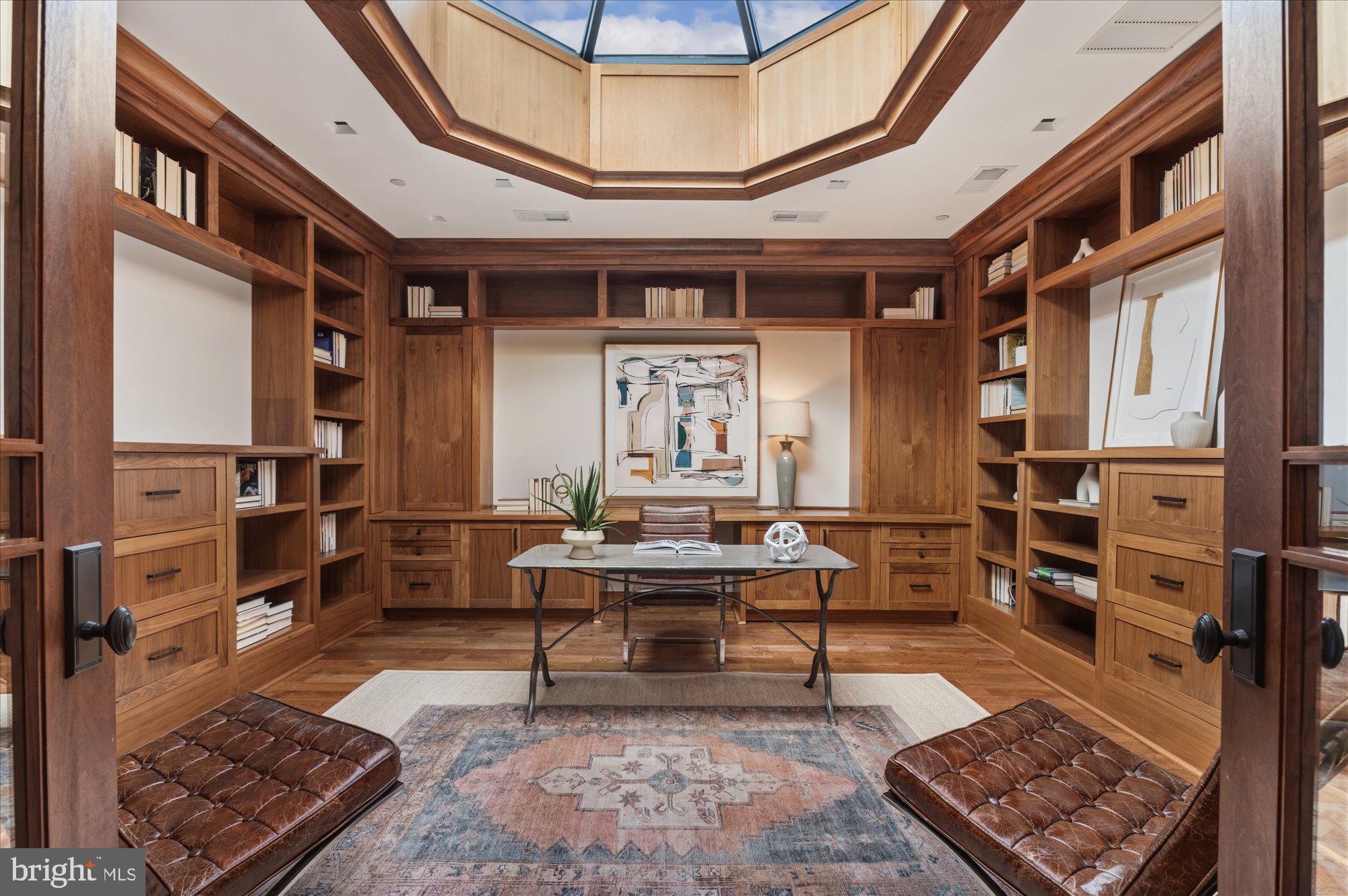 A rare opportunity to own a truly substantial Capitol Hill residence — two historic homes seamlessly combined to create a singular, curated estate defined by scale, flow, and architectural distinction.

The gallery living space is expansive & thoughtfully composed — designed to feel both elevated & inviting. Its generous scale allows it to function beautifully as a comfortable living room while easily accommodating larger gatherings. 

The dining room is an inviting, sophisticated space that feels both intimate & refined — the perfect setting for elegant dinners & effortless entertaining.

The family room offers a warm, comfortable counterpoint to the home’s larger entertaining spaces. Its flexible layout allows it to function beautifully for everyday use or as a natural extension of the home when hosting, providing additional space for guests.

Many homes claim to have a “chef’s kitchen,” but few deliver at this level. This is a truly exceptional, restaurant-grade space — featuring a Southbend massive cooktop, oven and range hood. Traulsen double refrigerator & separate freezer. Additional Alto-Shaam oven as well as Hobart and Bosch dishwashers. Designed to handle everything from everyday meals to large-scale entertaining and catered events, it offers a level of capability and presence that is genuinely hard to replicate.

The primary suite is impressively scaled & offers a comfortable sense of space.  In addition to the main sleeping area, it includes a private sitting room & a dedicated dressing room. The bathroom is well-executed, featuring custom tile work and a large steam shower.

he second and third bedrooms are both generously -proportioned and include abundant windows .  Each features its own en-suite bath with distinctive designer details.

Currently styled as a striking home office, the library is a standout space defined by a dramatic domed skylight that fills the room with natural light. The built-ins add presence and structure, creating a setting that feels intentional and commanding — well suited for focused work or high-level meetings. Its size and layout also offer flexibility, with the potential to convert back into a fourth bedroom if desired.

The lower level offers an expansive, impeccably-designed space dedicated to entertaining. Anchored by a full bar & an impressive 1,300-bottle climate controlled wine cellar, it’s ideally suited for hosting — from casual gatherings to more curated evenings with friends & guests.

The carriage house offers a bright, inviting space that provides a true sense of privacy from the main residence. It’s ideal for hosting guests who appreciate their own separate retreat. 

The back terrace takes full advantage of the home’s rare double lot, offering a generous outdoor space that feels both private and expansive. Outfitted with a built-in grill and Green Egg, it’s ready for casual weeknight dinners to a full evening of hosting. Distinct areas for dining and lounging, allowing the space to shift easily between lively gatherings and more relaxed, everyday use.

The home is further distinguished by a collection of rare features that elevate both convenience & daily living — including an elevator, a rooftop deck with an outdoor shower, & the benefit of a two-car garage plus two additional dedicated parking spaces. A Savant AV system is integrated throughout, allowing for seamless control of lighting, sound, & media.

Set in one of Capitol Hill’s most prestigious enclaves, this is a home for those who value presence, privacy, & a sense of individuality. It will appeal equally to those seeking a distinguished long-term residence or to those whose lives revolve around connection, influence, & entertaining at a high level. With its rare scale, thoughtful design, & unmistakable character. This is a property that stands apart from the expected & speaks to buyers who appreciate quality, intention, & living in a home that truly stands on its own.