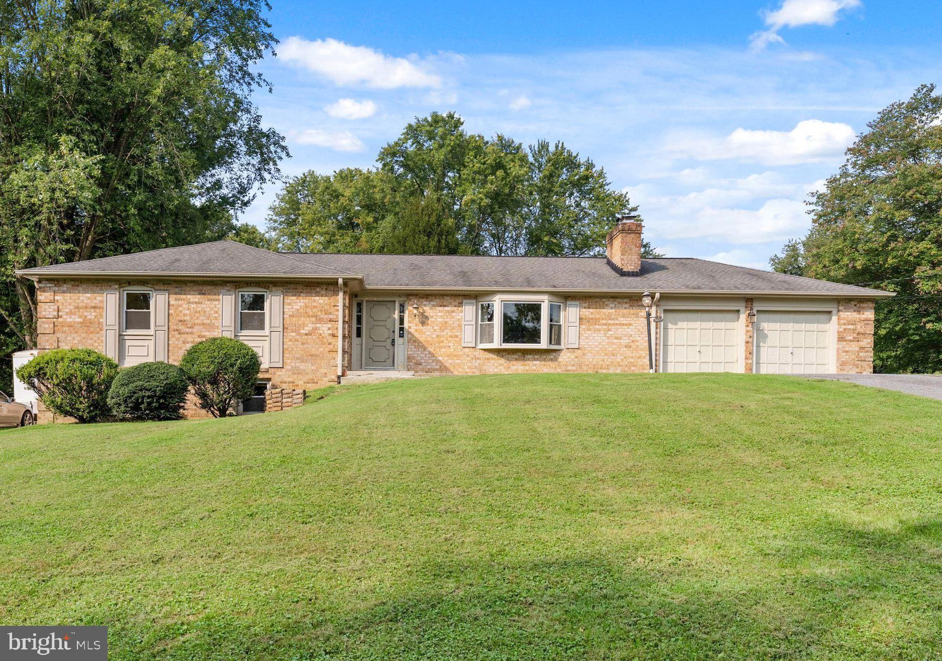 Charming brick rambler in desirable North Potomac! This property is situated on a large 1.05 acre lot with a swimming pool. Enjoy over 3,500 square feet of living space with 5 bedrooms and 2.5 bathrooms. The living room features a large bay window letting in tons of natural light with a cozy wood burning fireplace. You also have a formal dining room. The kitchen features an island with breakfast bar seating and ample storage space. Off the kitchen is the enclosed patio offering tons of additional living space and direct access to your back deck and yard. The park-like backyard is fully fenced with mature trees and a swimming pool with a diving board. The lower level of this home is finished with an additional rec room, bedroom, half bath, storage, and laundry space. Located within just minutes of shopping, restaurants, and public transit. Don't miss out on the opportunity to make this one your own!