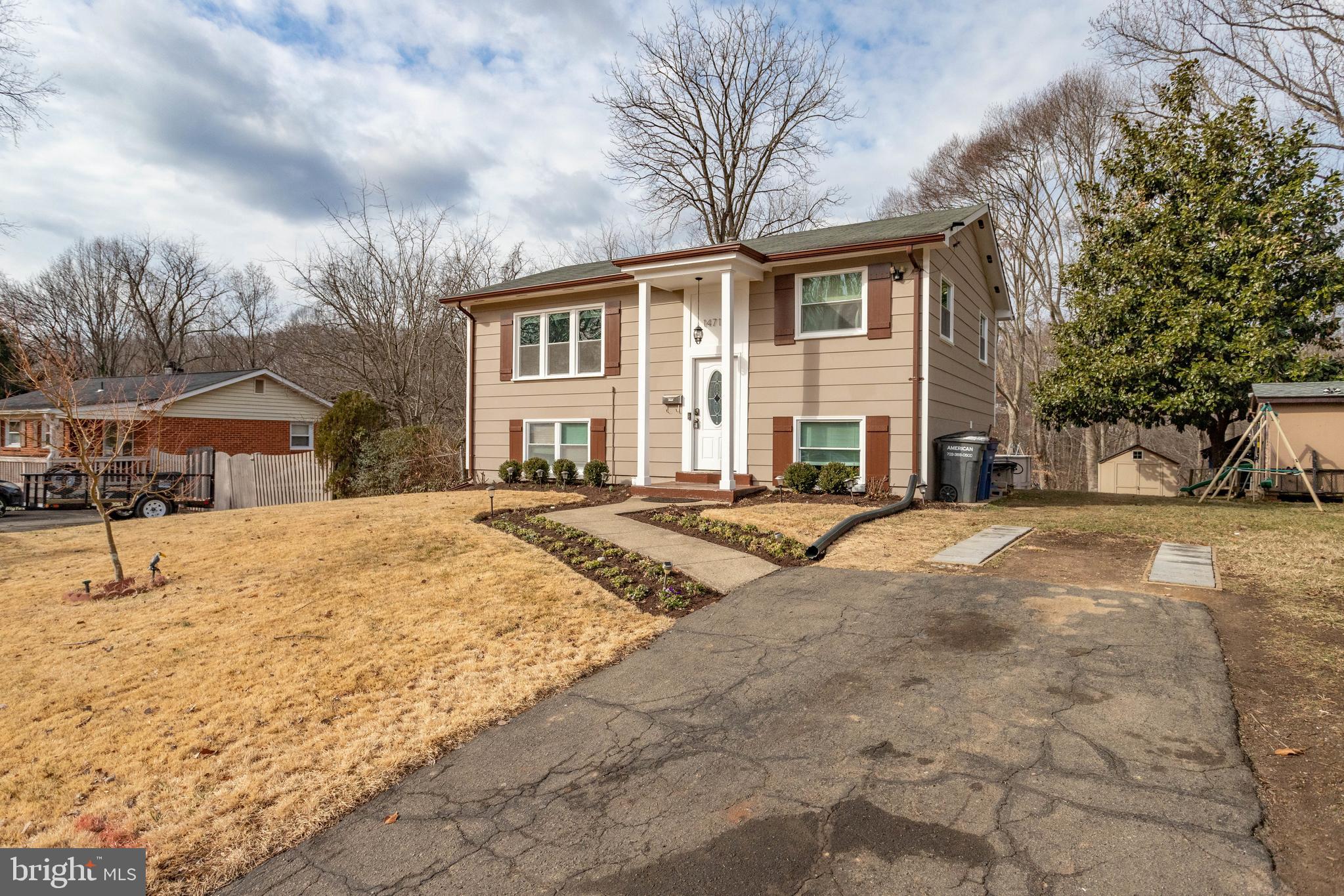 Nestled in the charming Dale City, this beautiful home underwent extensive renovations in 2018, resulting in a perfect blend of modern comforts and timeless elegance. The centerpiece is its stunning kitchen, adorned with stainless steel appliances. Gleaming ceramic tiles grace both floors and bathrooms, enhancing aesthetics and functionality. further illuminating the fresh paint and modern light fixtures. This residence offers more than just beauty; it's move-in ready, ensuring a seamless transition. Conveniently situated within walking distance of Dale City Elementary, it's an ideal location for families. With swift access to I-95 and PW Parkway, commuting is a breeze. Nestled in a serene cul-de-sac on a private road, this property offers a tranquil retreat that you'll truly savor. As you step into the backyard, you'll be captivated by the enchanting Greek view, a vista that showcases the untouched beauty of nature while enveloping you in a cocoon of privacy like no other.