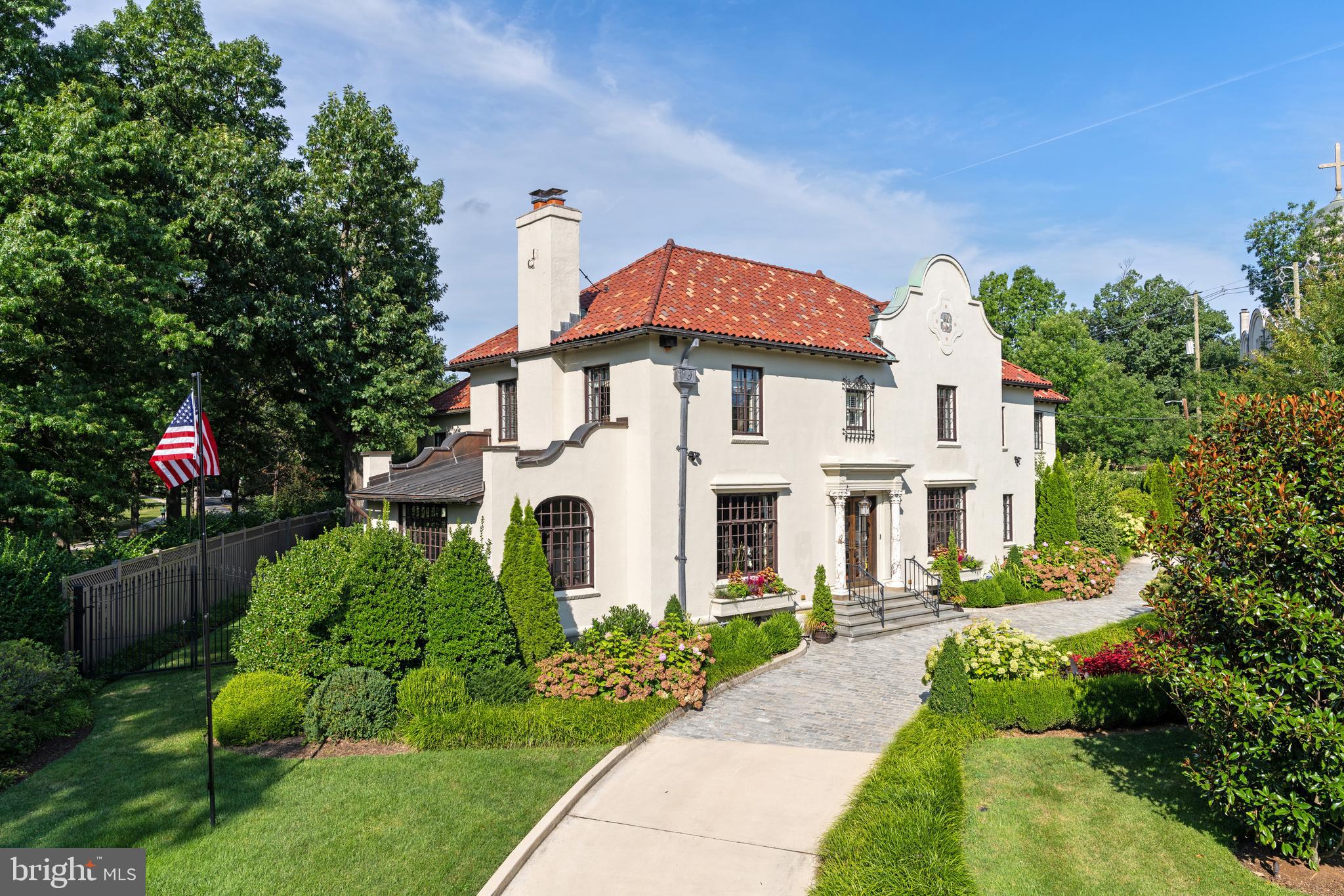 Prominently sited in prestigious Observatory Circle, the historic Heurich-Parks House at 3400 Massachusetts Avenue, NW presents a rare opportunity to own a fully reconstructed Washington estate. Originally built in 1925 by architect Albert S.J. Atkinson and once home to Christian Heurich Jr., a philanthropic businessman, as well as Marshall Parks, known as the "Father of Pediatric Ophthalmology". This distinguished Spanish Mission-style residence was masterfully reconstructed and expanded in 2017 by renowned BarnesVanze Architects, seamlessly blending historic provenance with modern luxury. Set on a beautifully landscaped and level 0.39-acre lot with irrigation, the property is introduced by a grand circular driveway and features a detached 2-car garage with guest house studio above and additional parking pad. Encompassing approximately 13,900 square feet, the residence offers 7 bedrooms, 9 full baths, 2 half baths, and an elevator. The main level is defined by elegant entertaining spaces, complemented by a stunning open kitchen with marble countertops, herringbone floors, and a sunlit breakfast room. Designed for both grand-scale living and everyday comfort, the home includes an extraordinary indoor swimming pool with pool bath, bar, and Desert Air dehumidification system.  A convenient main level bedroom suite also completes this level. The luxurious owner’s suite features a spa-inspired bath and dual walk-in closets. There are four other bedroom suites on this level. The expansive lower level offers a recreation room, exercise room, wine storage, laundry, full bath with sauna, and multiple storage rooms. A truly exceptional offering combining architectural significance, modern amenities, and premier location adjacent to the Naval Observatory and Vice President's Mansion!