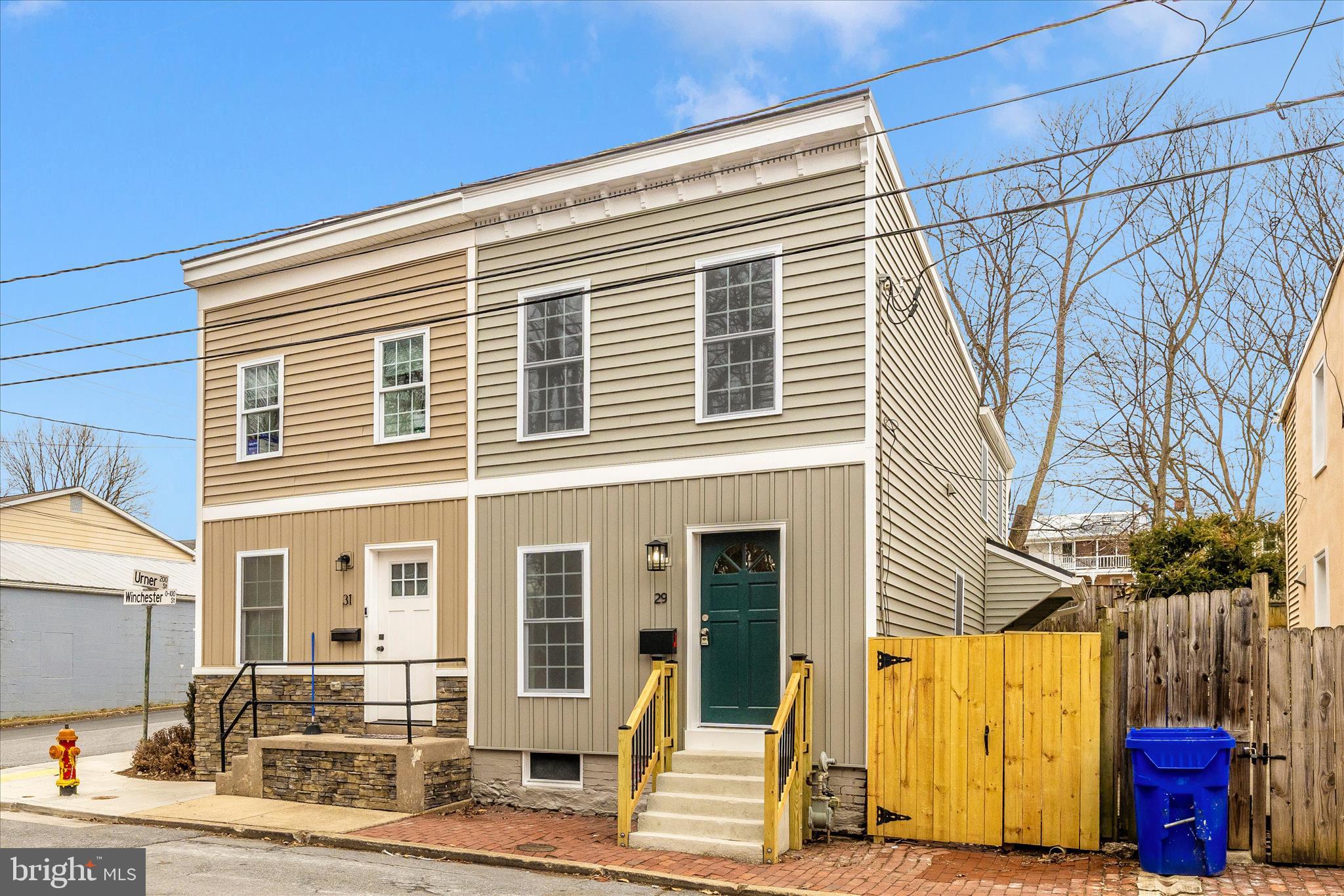 SELLER WILL CONSIDER ALL OFFERS AND WILL HELP WITH BUYER'S CLOSING COSTS. Fully renovated inside and out and walking distance to the heart of downtown Frederick!  Discover this beautifully renovated townhouse in the heart of downtown Frederick, just steps from the vibrant shops, dining, and entertainment of historic downtown. Completely updated from the inside out, this move-in-ready home blends classic charm with modern upgrades. Step inside to find a brand-new kitchen featuring stylish new cabinetry, new quartz countertops, and new dishwasher.  Other appliances include a stainless steel refrigerator, range, microwave and front-load washer/dryer on upper level.  The fully renovated bathrooms offer fresh, contemporary finishes, while new flooring flows seamlessly throughout the home. Fresh paint brightens every room, creating a clean and inviting atmosphere. Major improvements provide peace of mind, including new siding, roof and windows. The primary bedroom offers a private deck—an ideal spot to enjoy your morning coffee or unwind in the evening.  Outside, enjoy your own private retreat with a patio ideal for relaxing or hosting guests, plus a fully fenced backyard offering both privacy and space for pets or play.  Located within walking distance to the heart of downtown Frederick’s boutiques, restaurants, parks, and community events, this turnkey townhouse offers the perfect combination of location, comfort, and style!