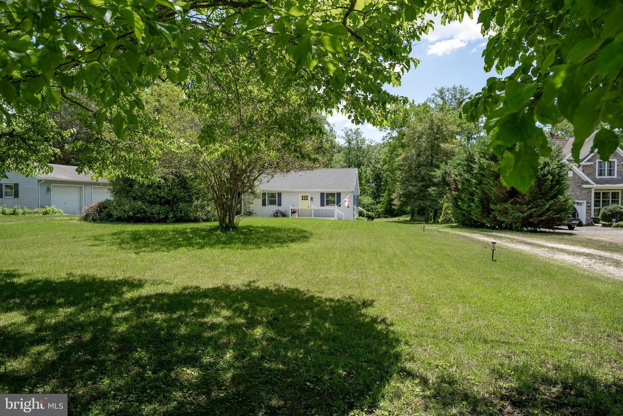Cute cottage located on the upper Chester River!  Entertain on the spacious rear deck.  Watch the Chester River slowly meander to more wide open waters.  Follow the gently sloped backyard to the updated bulkhead at the water's edge.  Launch your kayak and explore the river and allow the tide to take you as you explore the river.  When done relax indoors to an updated home that offers an open floor plan as the living room and kitchen merge as one.  This home was updated several years ago so there is very little you would need to do other than adding your own personal touches.  There are 2 bedrooms with wood floors and a single bath.  The living room and one of the bedrooms offers access to the rear deck through sliding glass doors.  There is a full basement with connecting stairs from the main level.  Here is where you will find the laundry.  There is plenty of storage space and could possibly be finished living space if the new owner would like to tackle the project.  You will be hard pressed to find anything on the water this cute and in this price range so come take a look and decide for yourself!