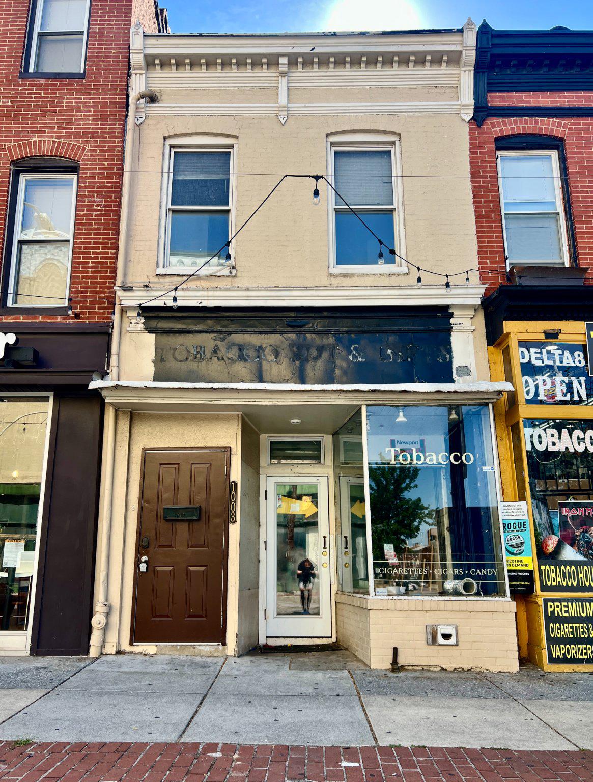 1003 South Charles Street presents a 2-unit mixed-use opportunity (RETAIL + APARTMENT). The property’s retail space features an efficient layout with open floor plan + private rear area with restroom and office potential. Former use was tobacco store. A dedicated entry, ample natural light, and a functional back-of-house area ensure effortless daily operations. [6.26.2026] Lease pending (last rented for $3,000/month). The apartment is a 2 BR / 1 BA + Den w/ in-house washer/dryer. Bedroom 1 shown with french doors, bedroom 2 shown as loft on 3rd floor. Apartment last rented for $1,700/month. Building is fully vacant and can be delivered vacant for owner-user. Contact Brexton Commercial or showing contact for more information.
